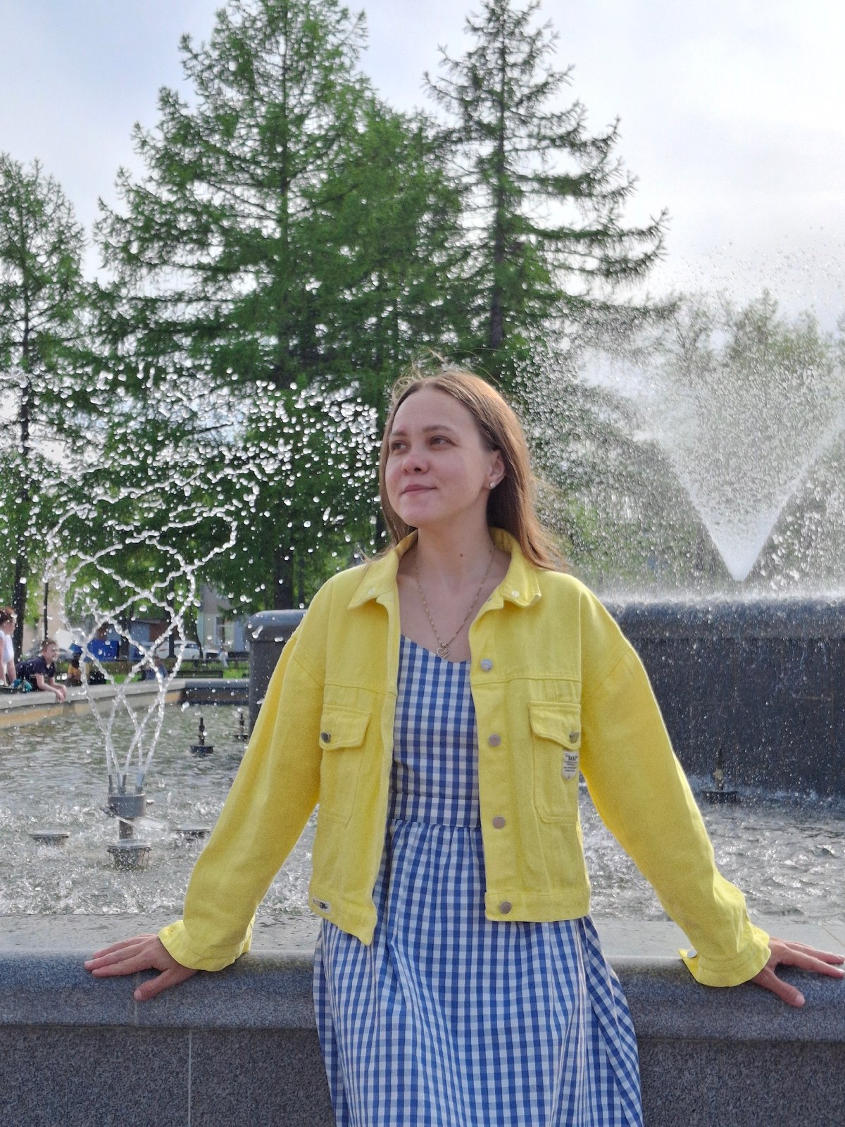 Tourist photography session documented across Chaikovsky, Russia parks and fountain