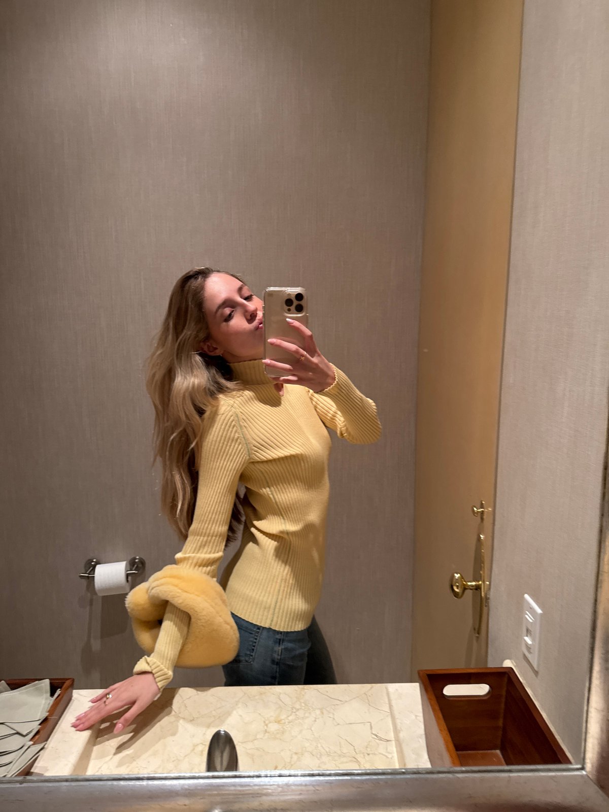 Woman takes bathroom selfie in Mexico City early morning
