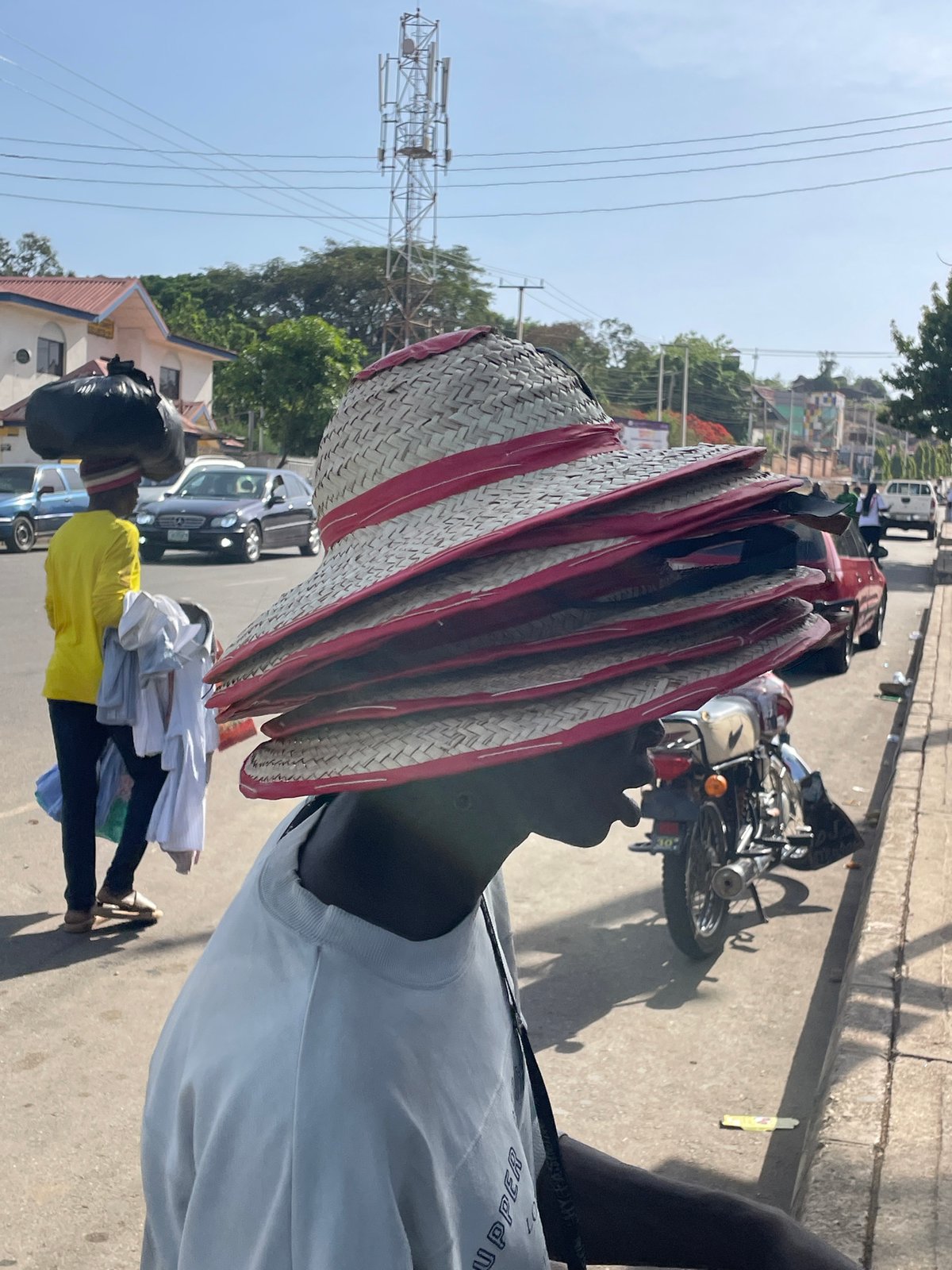 Community gatherings, dancing, and market activity documented across Jos, Nigeria