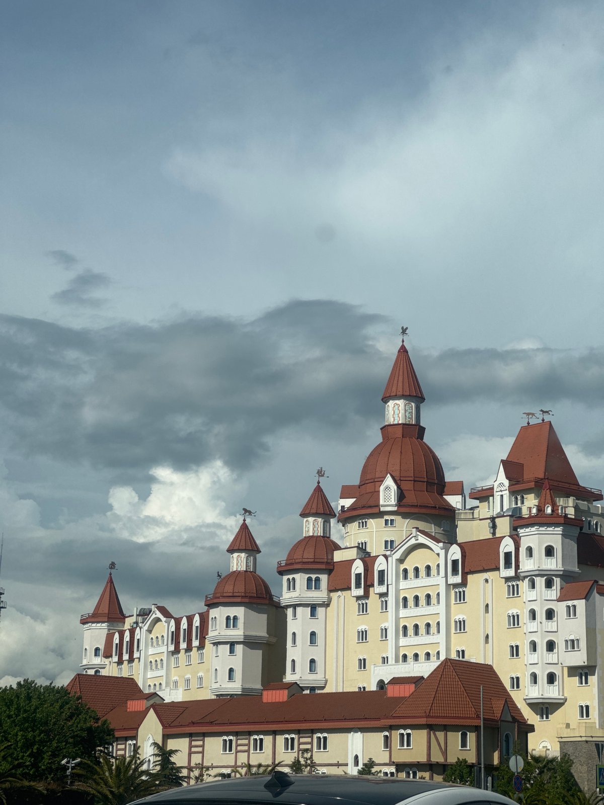 Castle-style building with red towers observed in Sirius, Russia