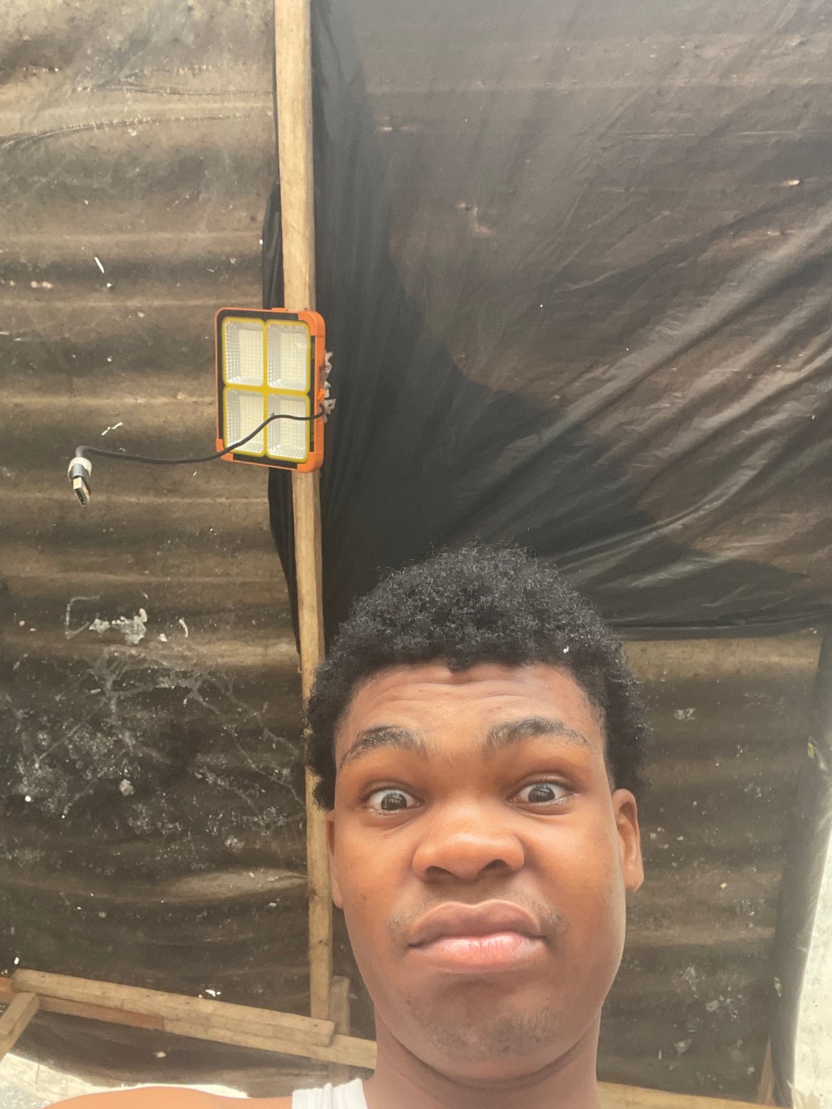 Selfies and street life in Ilado, Nigeria, one July morning