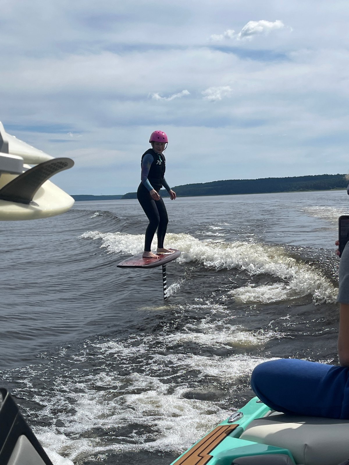 Hydrofoiling on a Russian lake, lifted clean above the water
