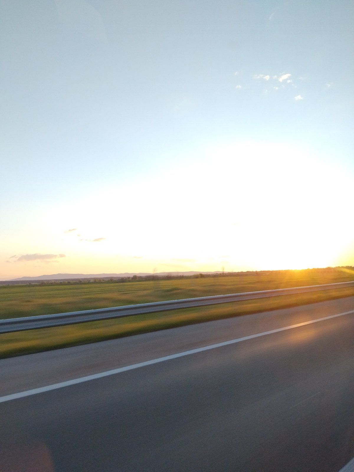 Sunset documented on rural road in Opalchenets, Bulgaria