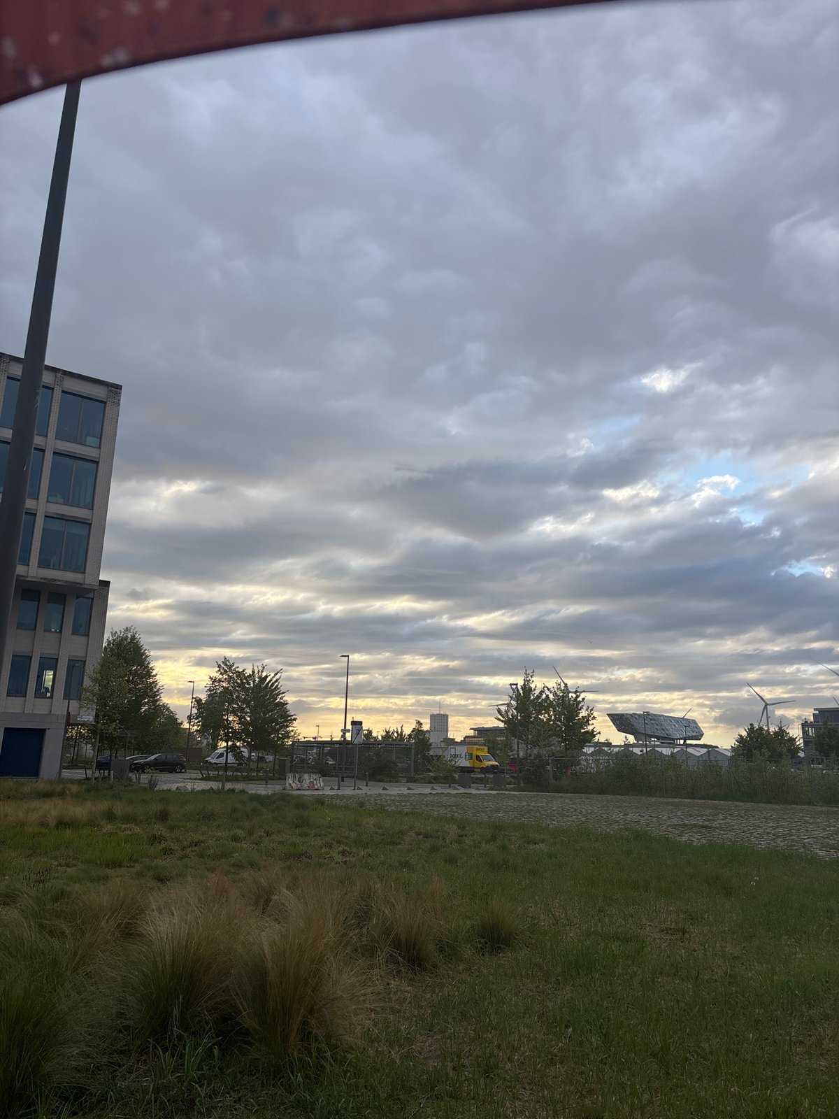Witness documents Antwerp waterfront and industrial scenes under cloudy skies