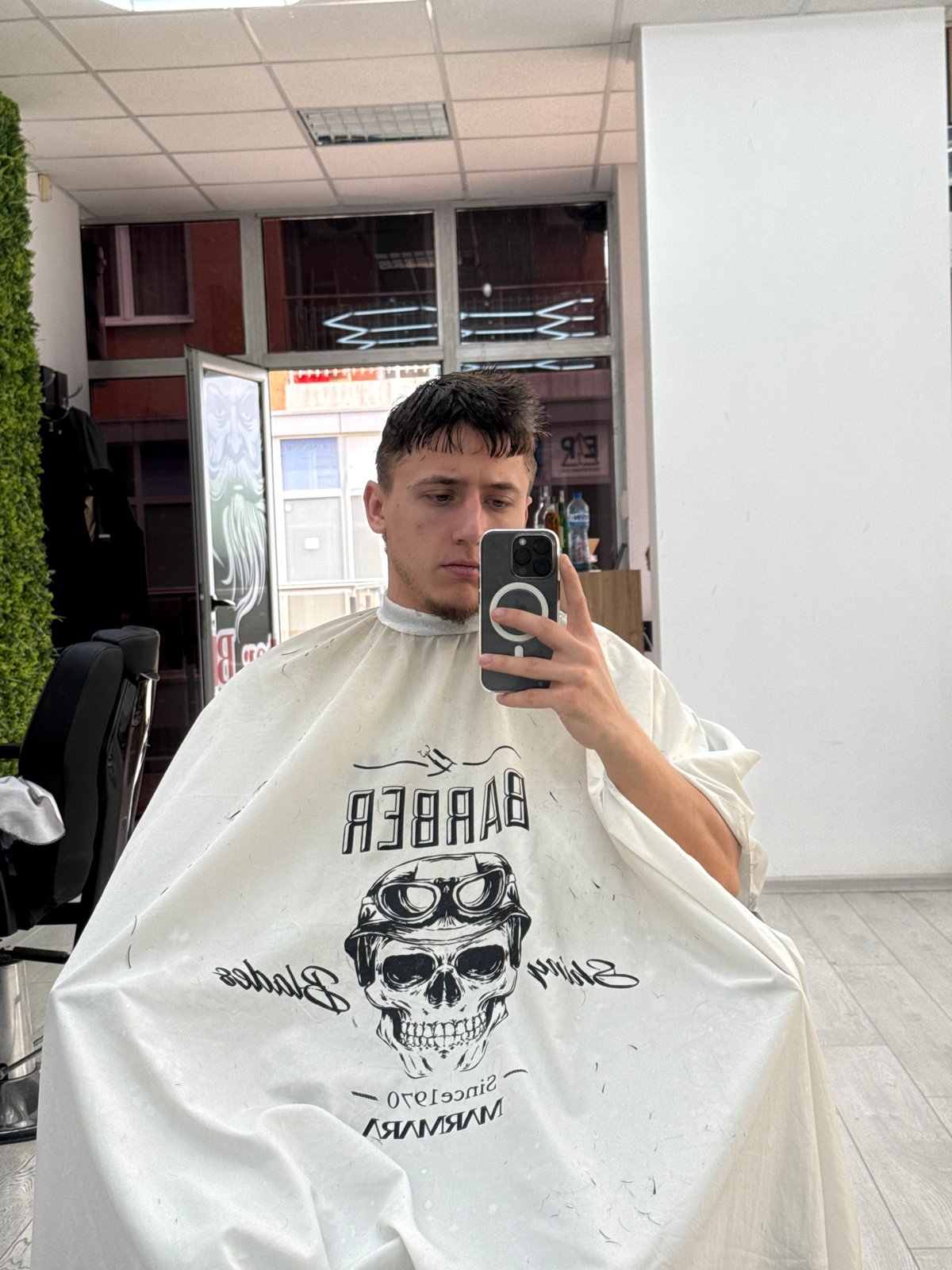 Man documents barbershop visit with selfies in Sofia