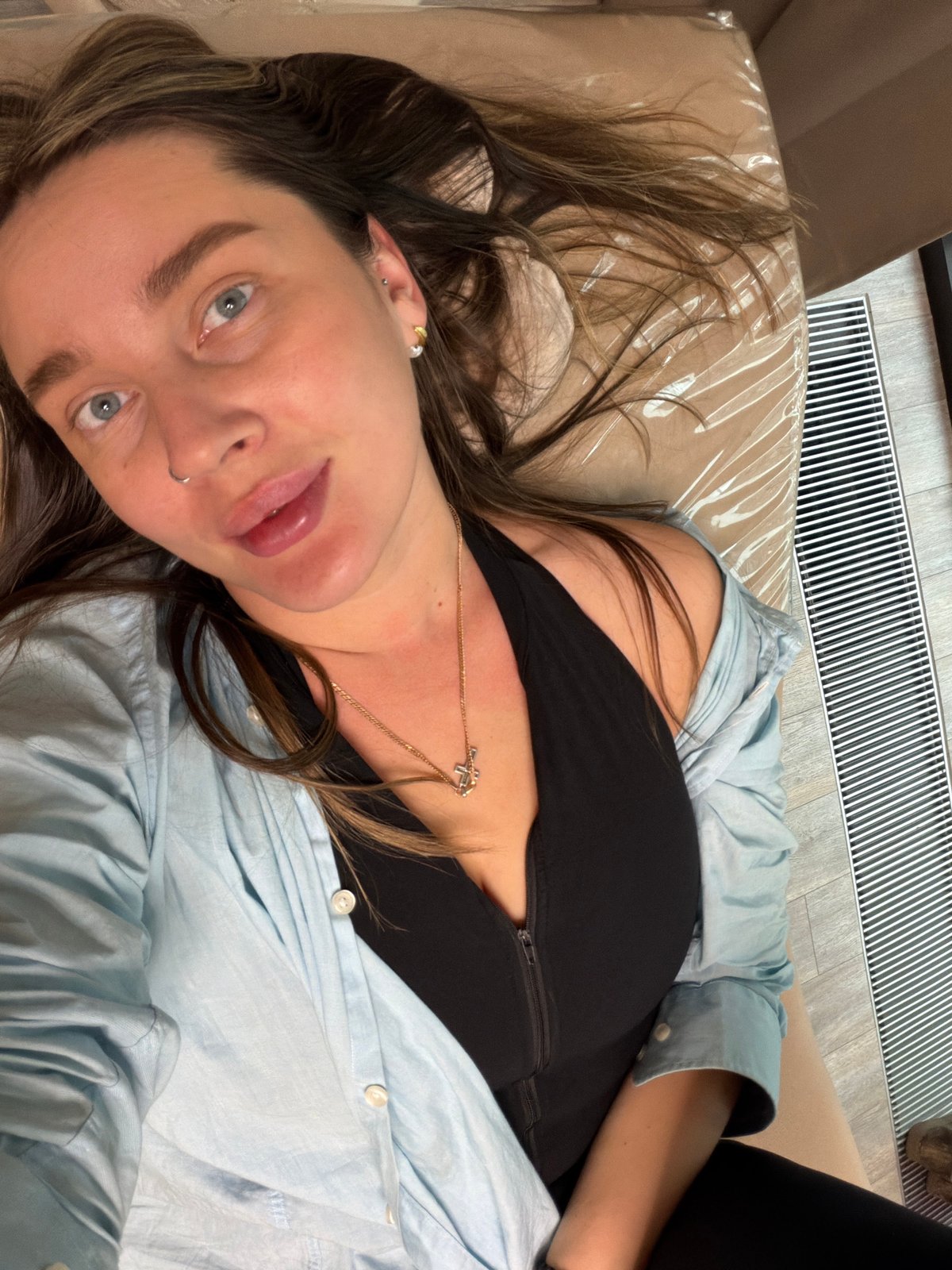 Woman with piercings observed resting in Moscow