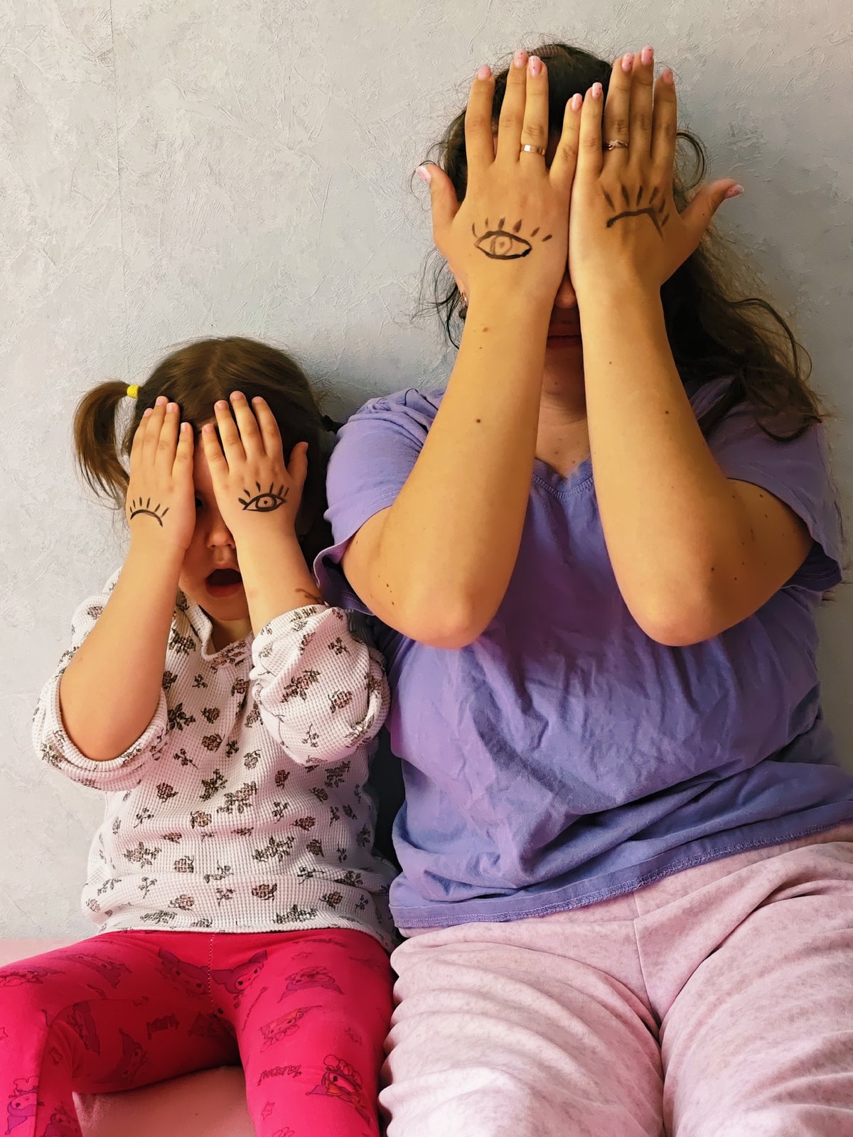 Mother and child share playful moments in Chaikovsky home