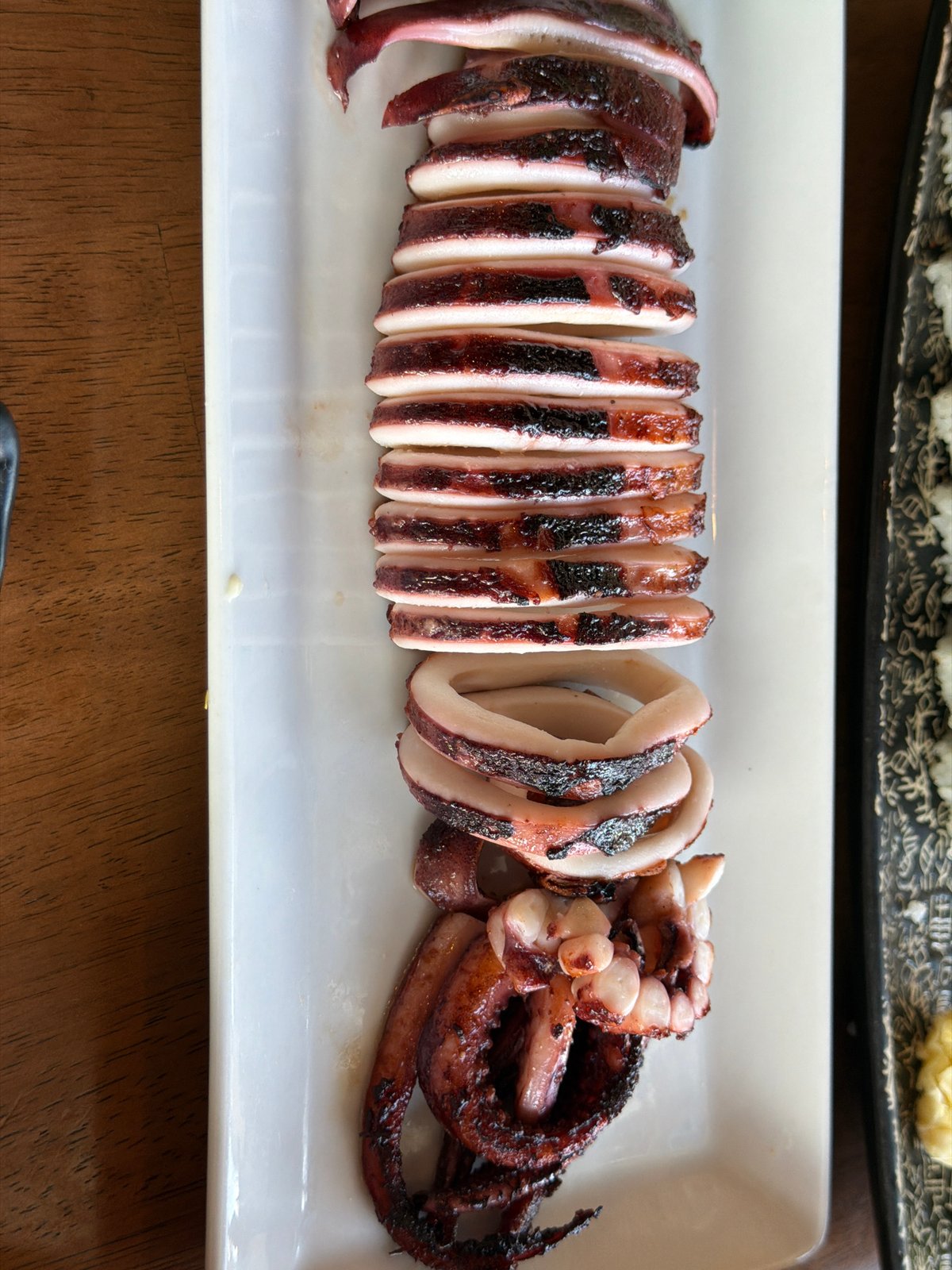Grilled squid dish documented at Vancouver restaurant