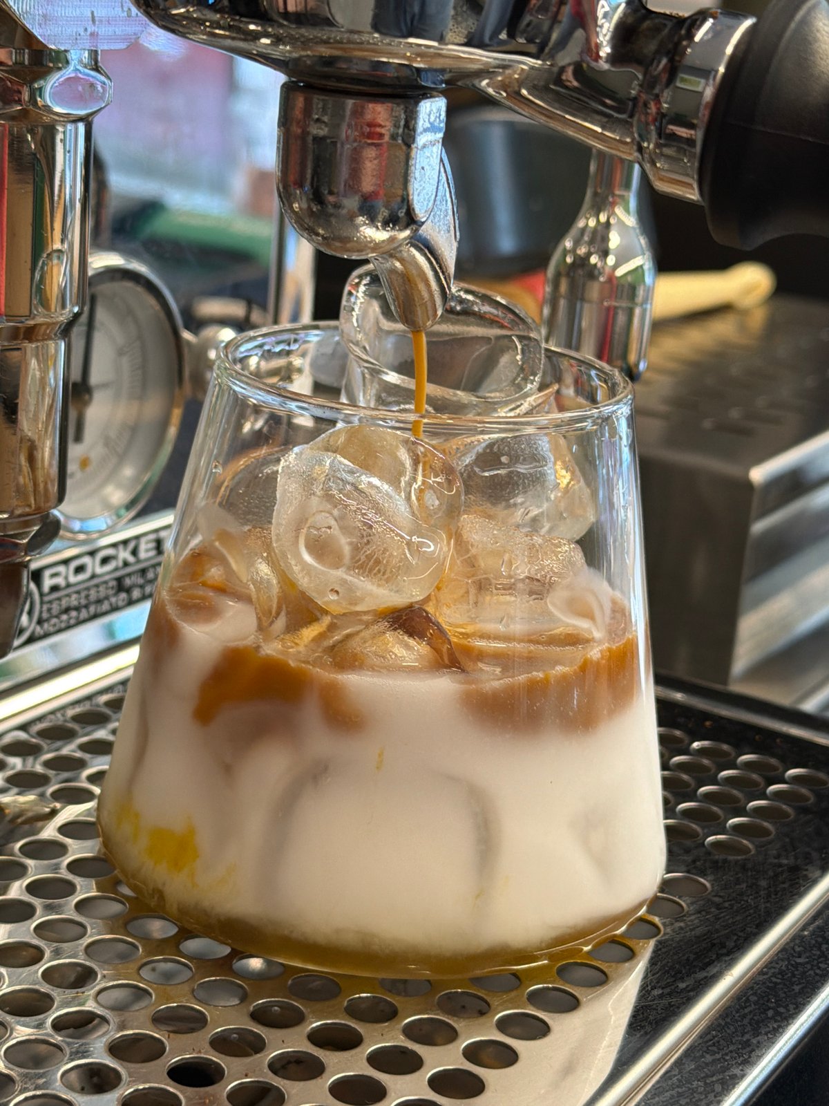 Iced latte prep and presentation at a Sofia café