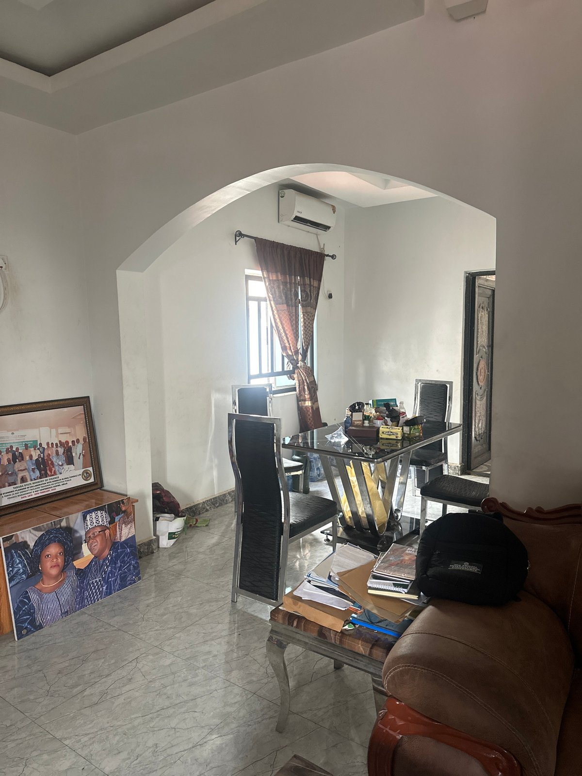Inside and outside a Jalingo residence, vehicles and interiors