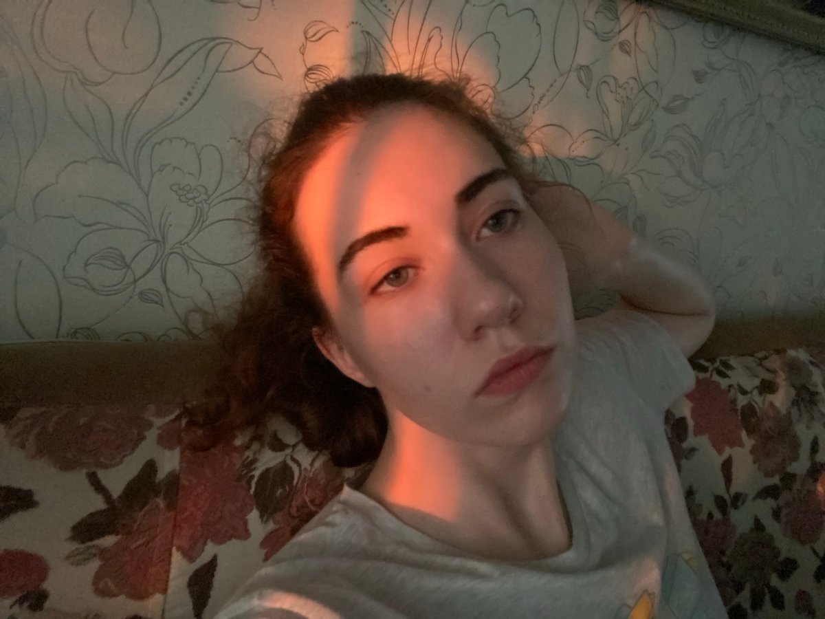 Sunset light through curtains, selfies inside a Zavodoukovsk apartment