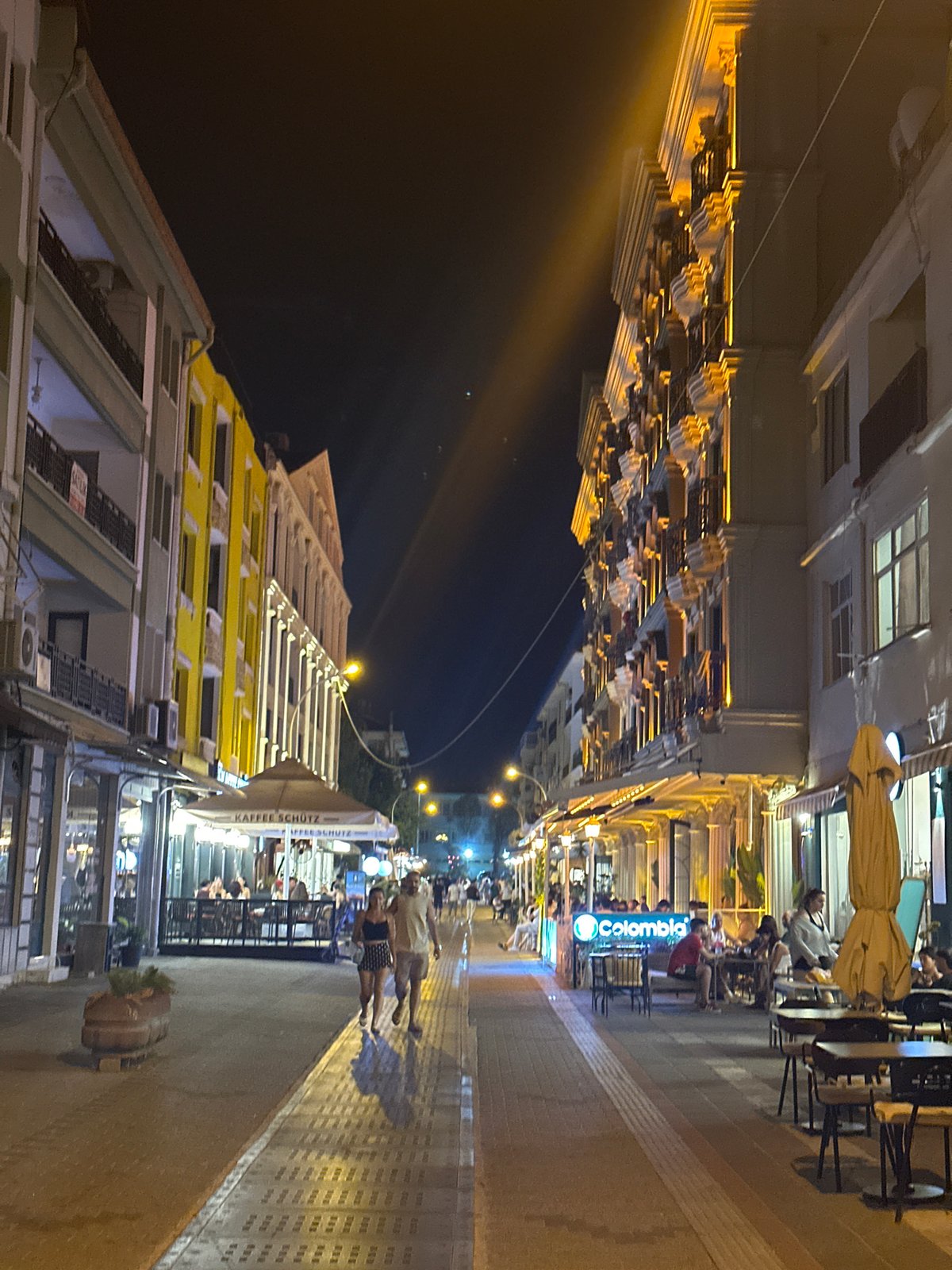 Fethiye's pedestrian strip buzzes with evening restaurant and cafe life.