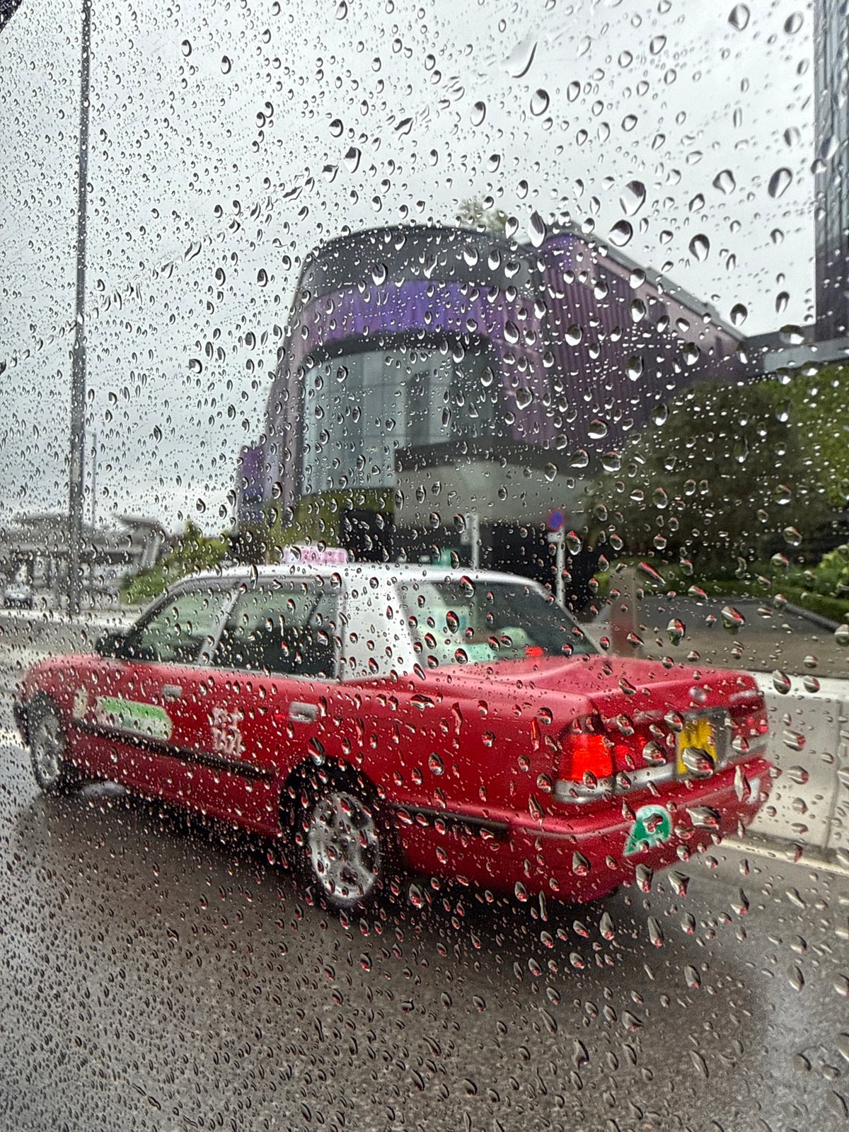 Rainy morning street scene captured in Hong Kong