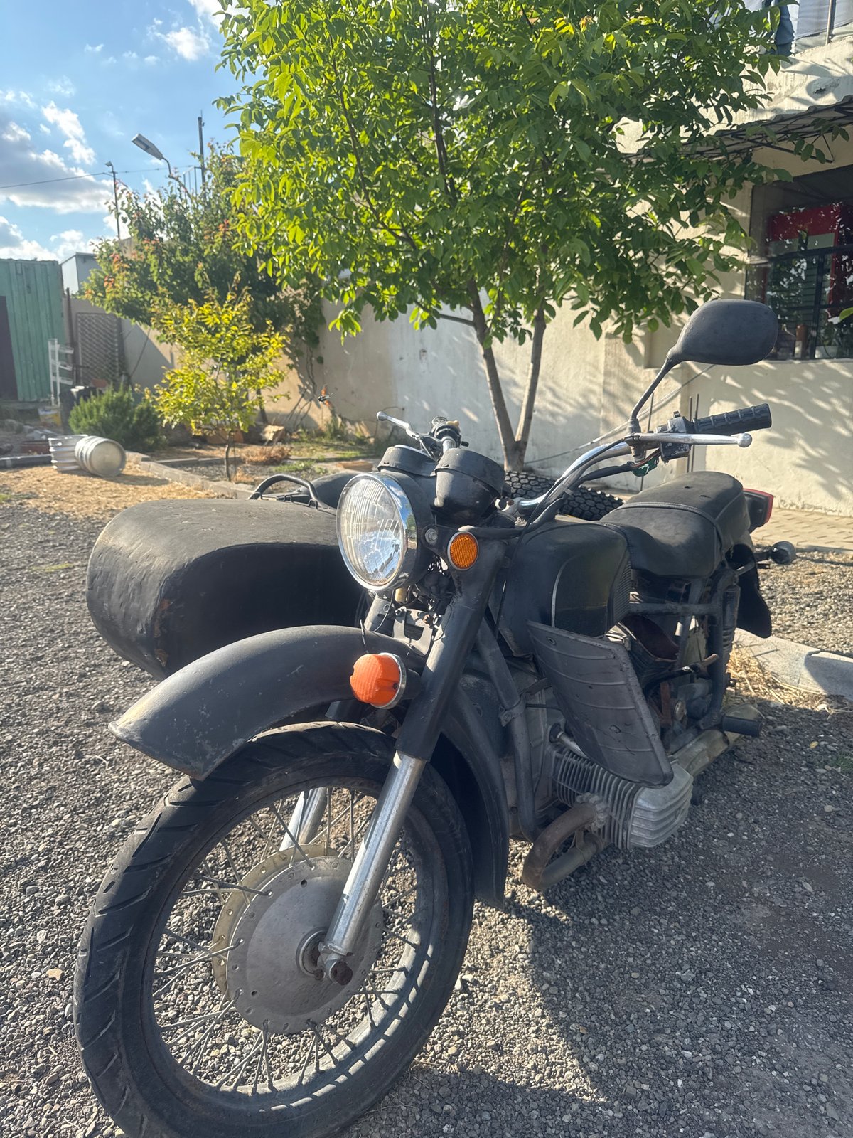 Vintage motorcycles on containers documented near Tbilisi cathedral