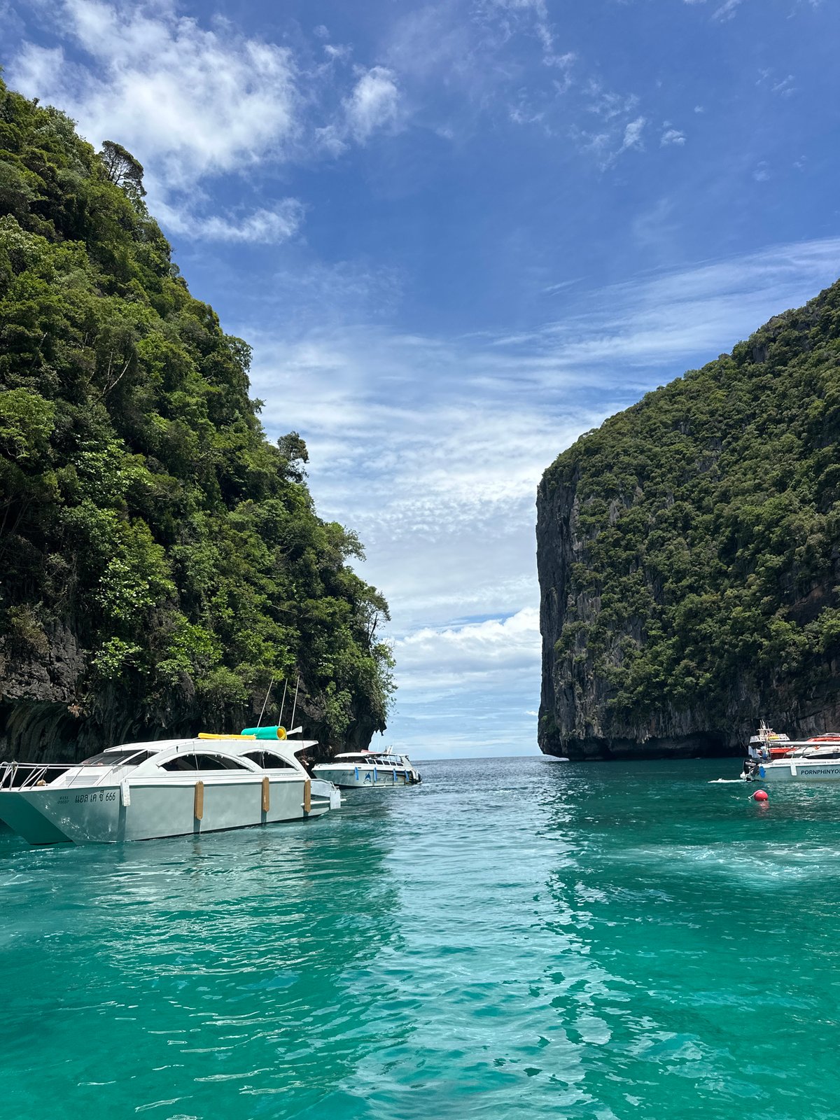 Ao Nang bay life: boats, karsts, and shoreside crowds