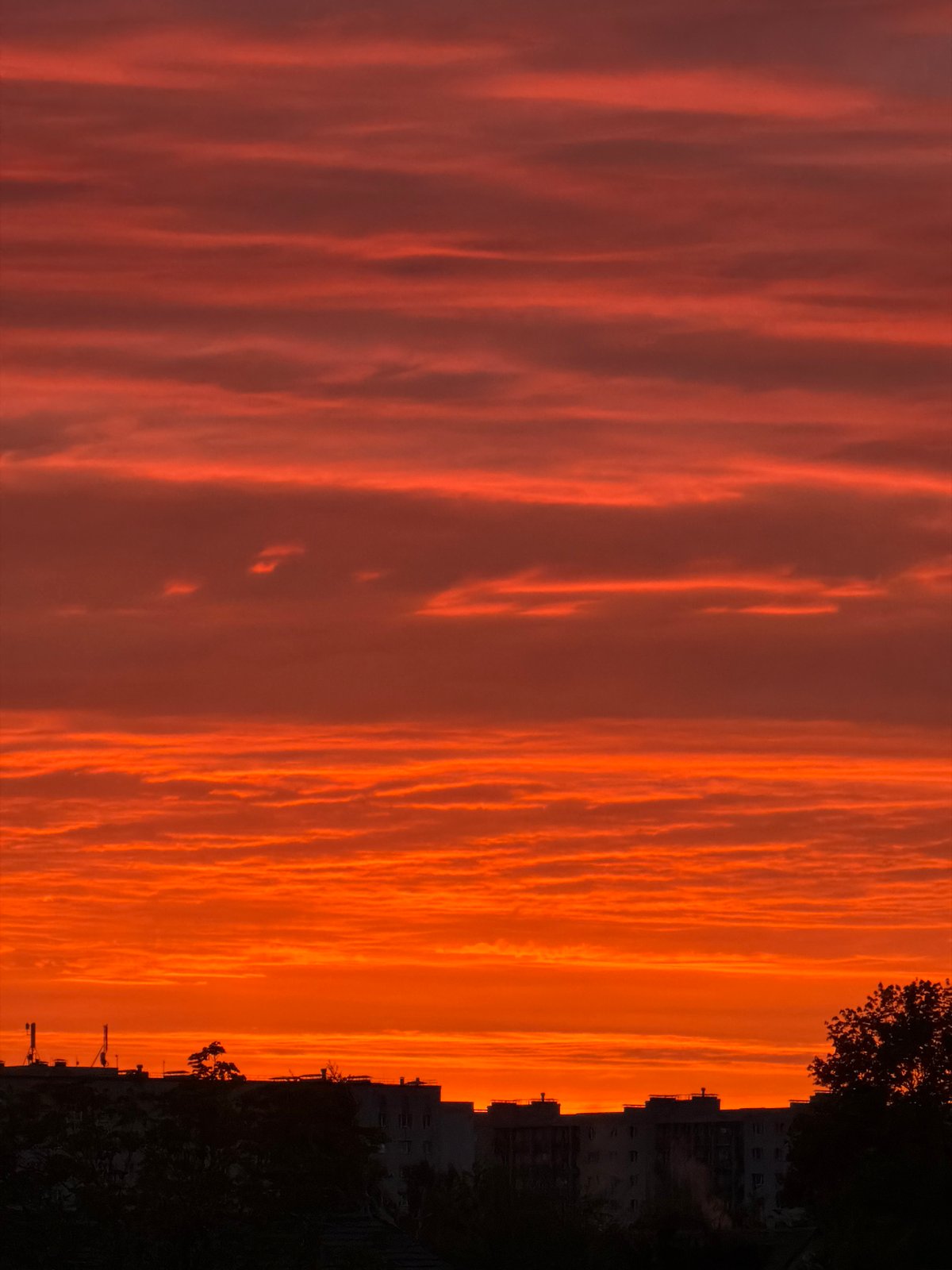 Colorful sunset captured over Dreiliņi, Latvia