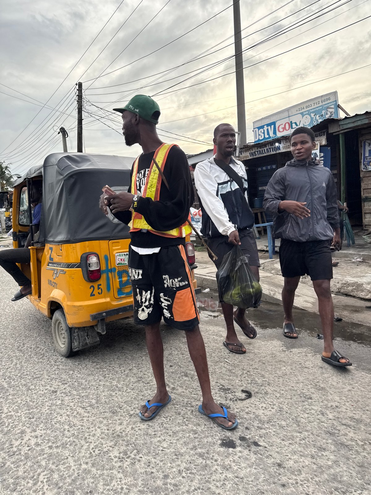 Street scenes captured in Ado, Nigeria during overcast afternoon