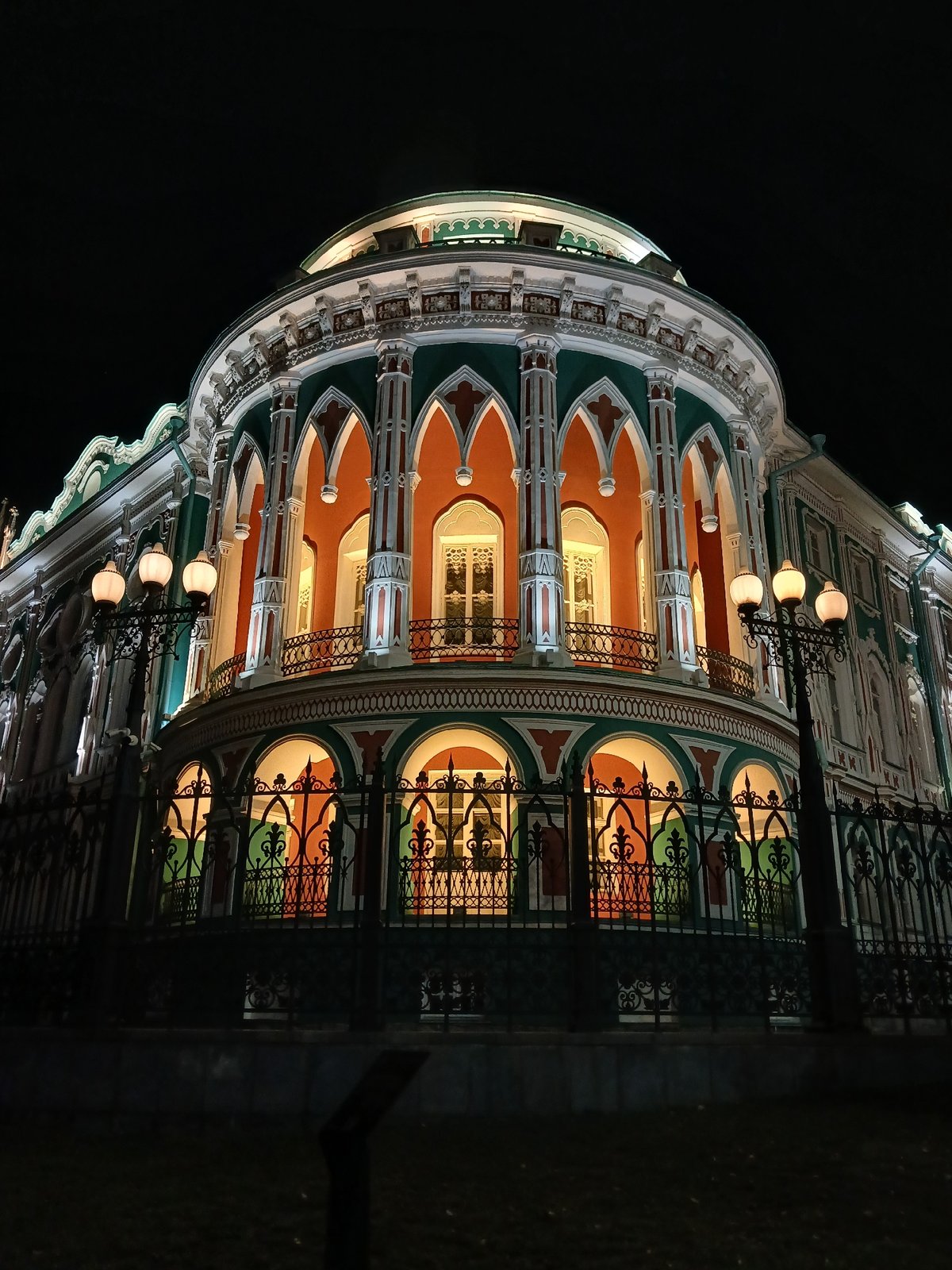 Night walk through illuminated Yekaterinburg landmarks and Iset River waterfront