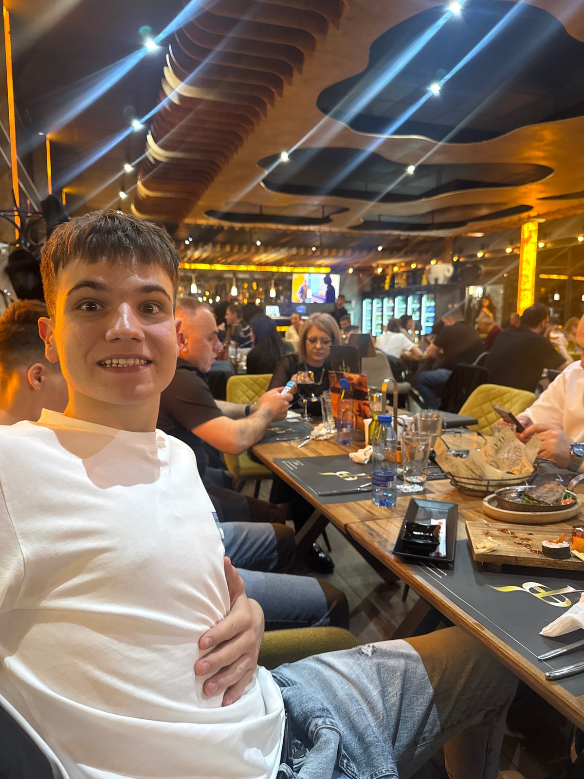 Young man photographed dining at restaurant in Vidin, Bulgaria