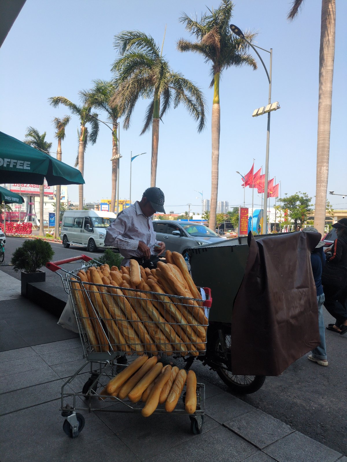 Morning street activity documented in Quy Nhon Ward, Vietnam