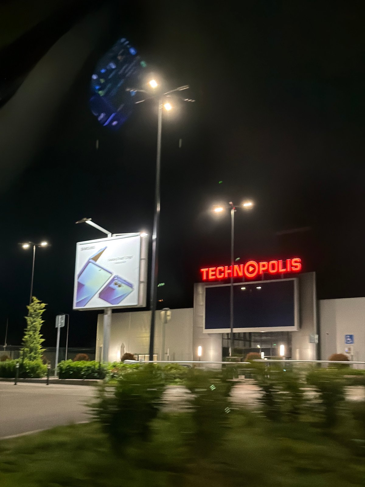 Nighttime commercial building photographed in Lovech, Bulgaria