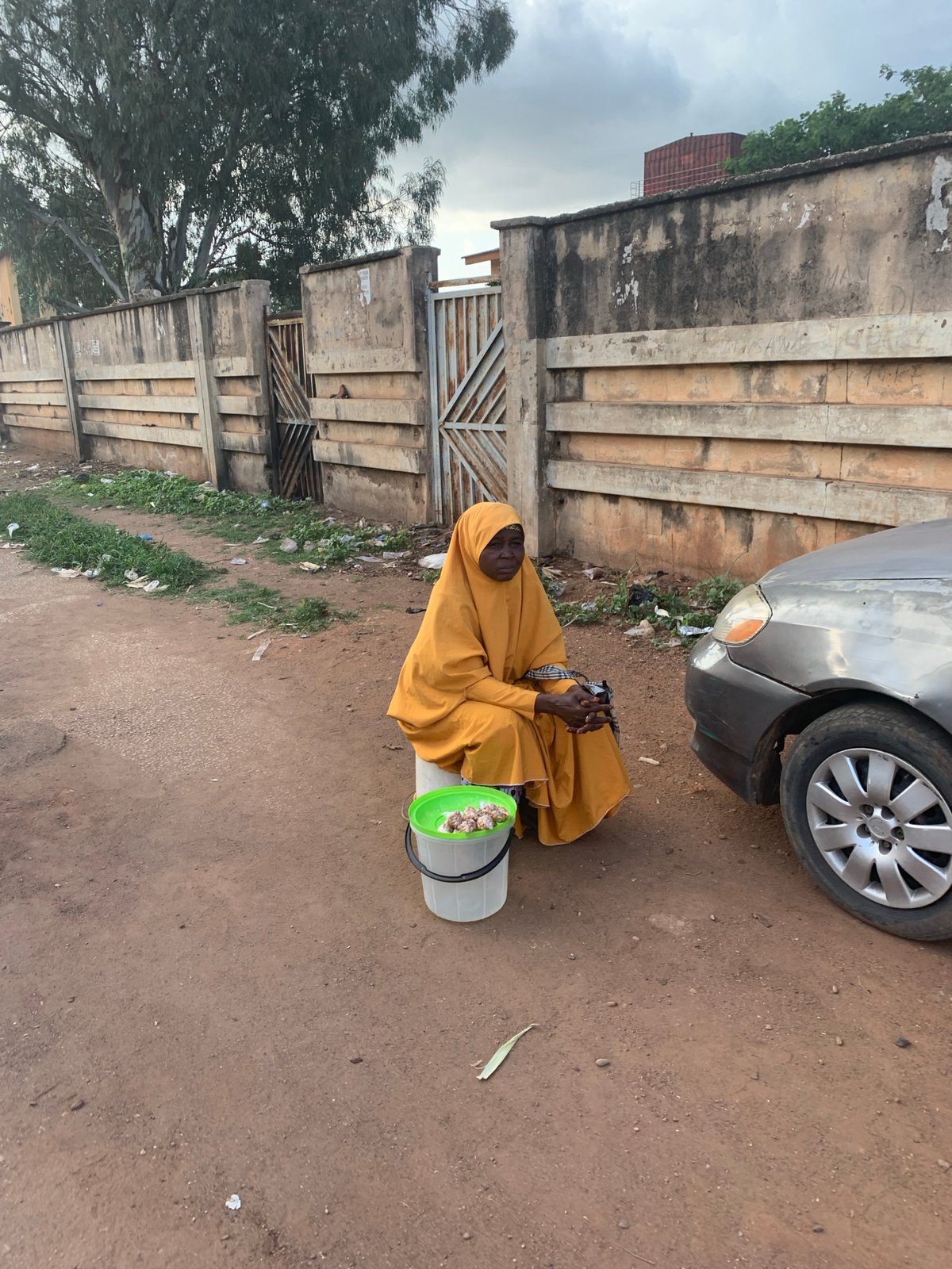 Street life and commerce moving through Jos, Nigeria