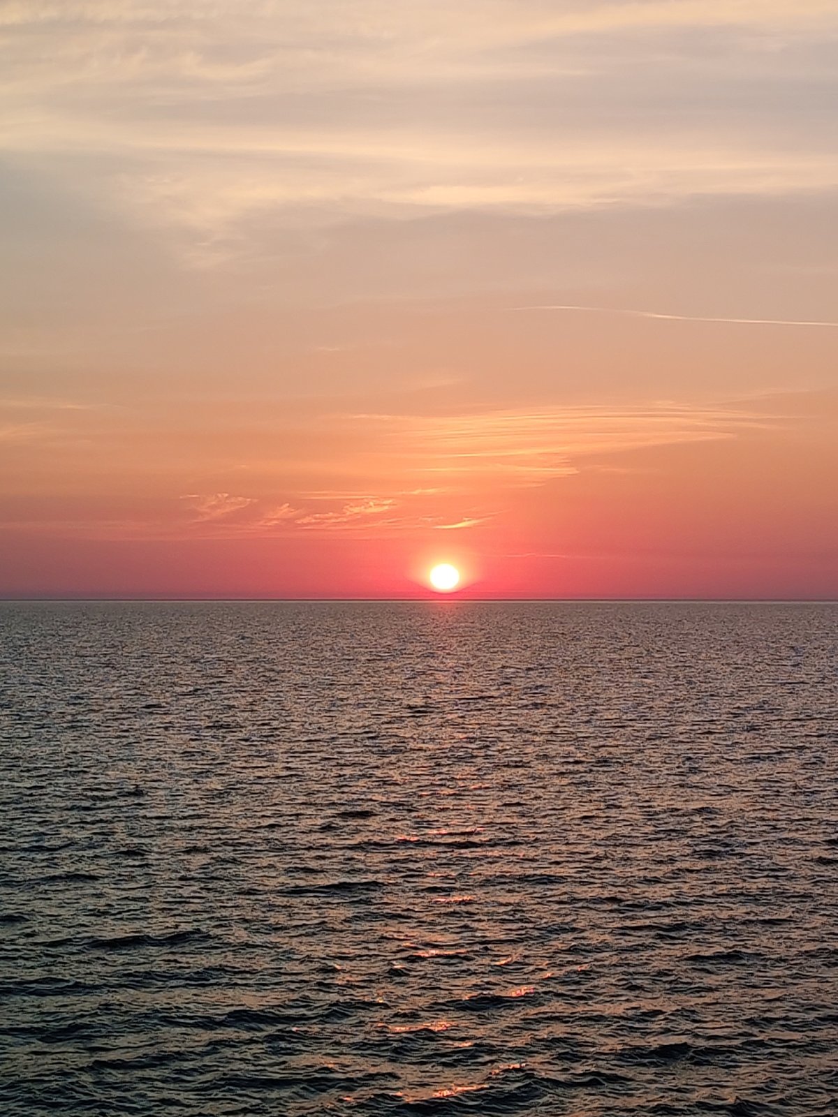Pastel sunset fades over the Baltic Sea near Shcheleiki