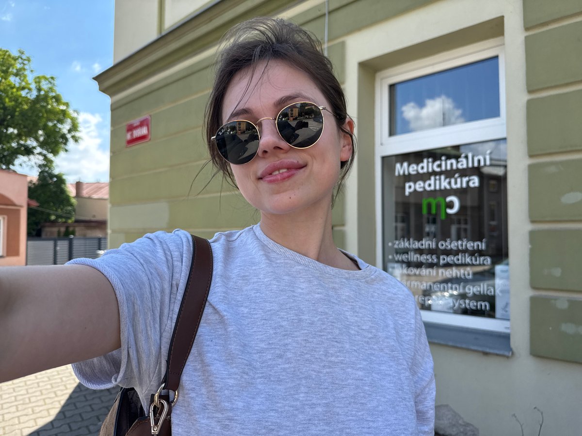 Strolling through Vrchlabí's historic town center on a summer morning