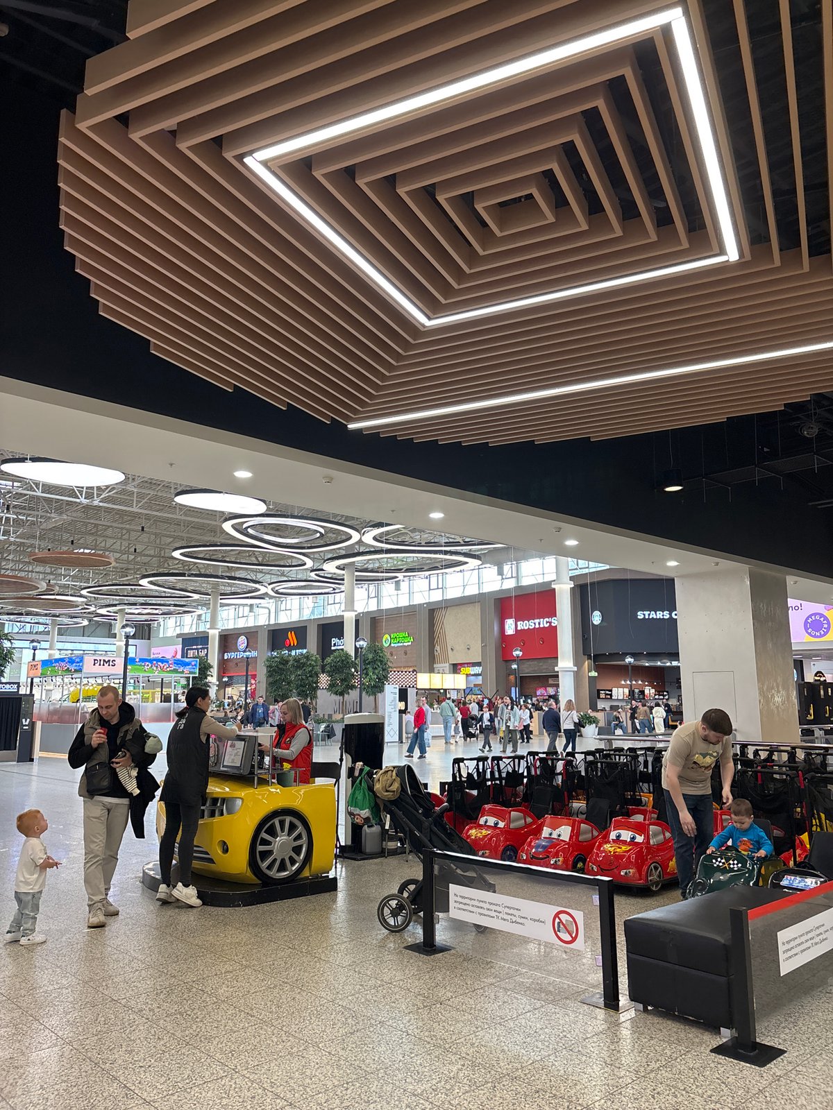 Casual afternoon moments captured at Kudrovo shopping mall