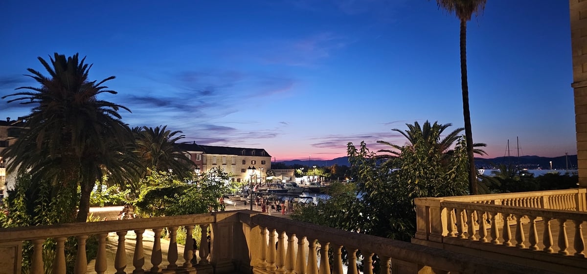 Dusk in Supetar: harbor, bell tower, and stone streets