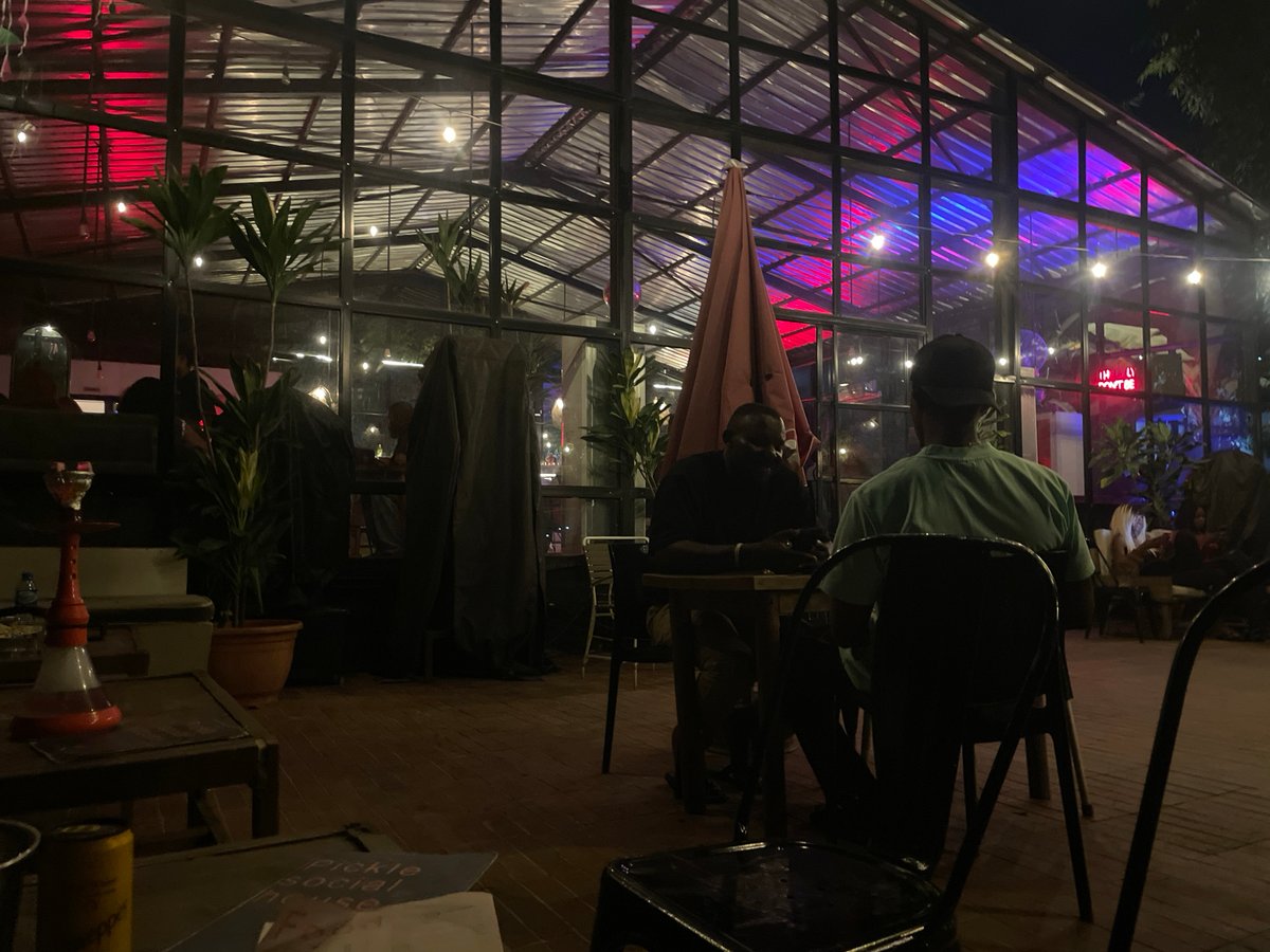 Evening at a glass-roofed lounge in Abuja