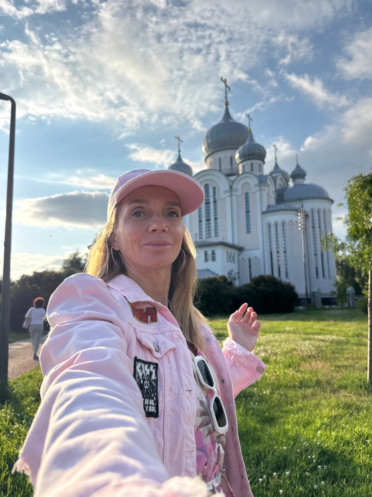 Selfies and roses at a Saint Petersburg Orthodox church