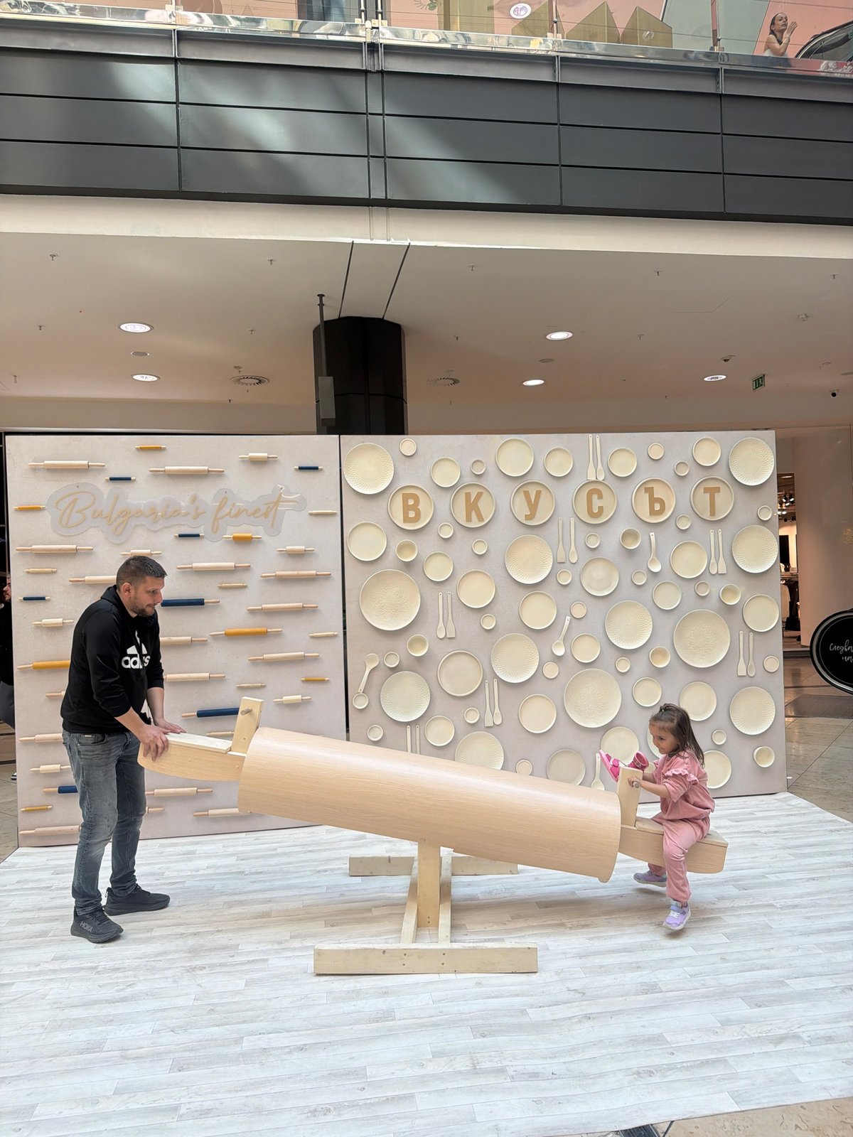 Shopping mall visitors engage with art installation in Sofia