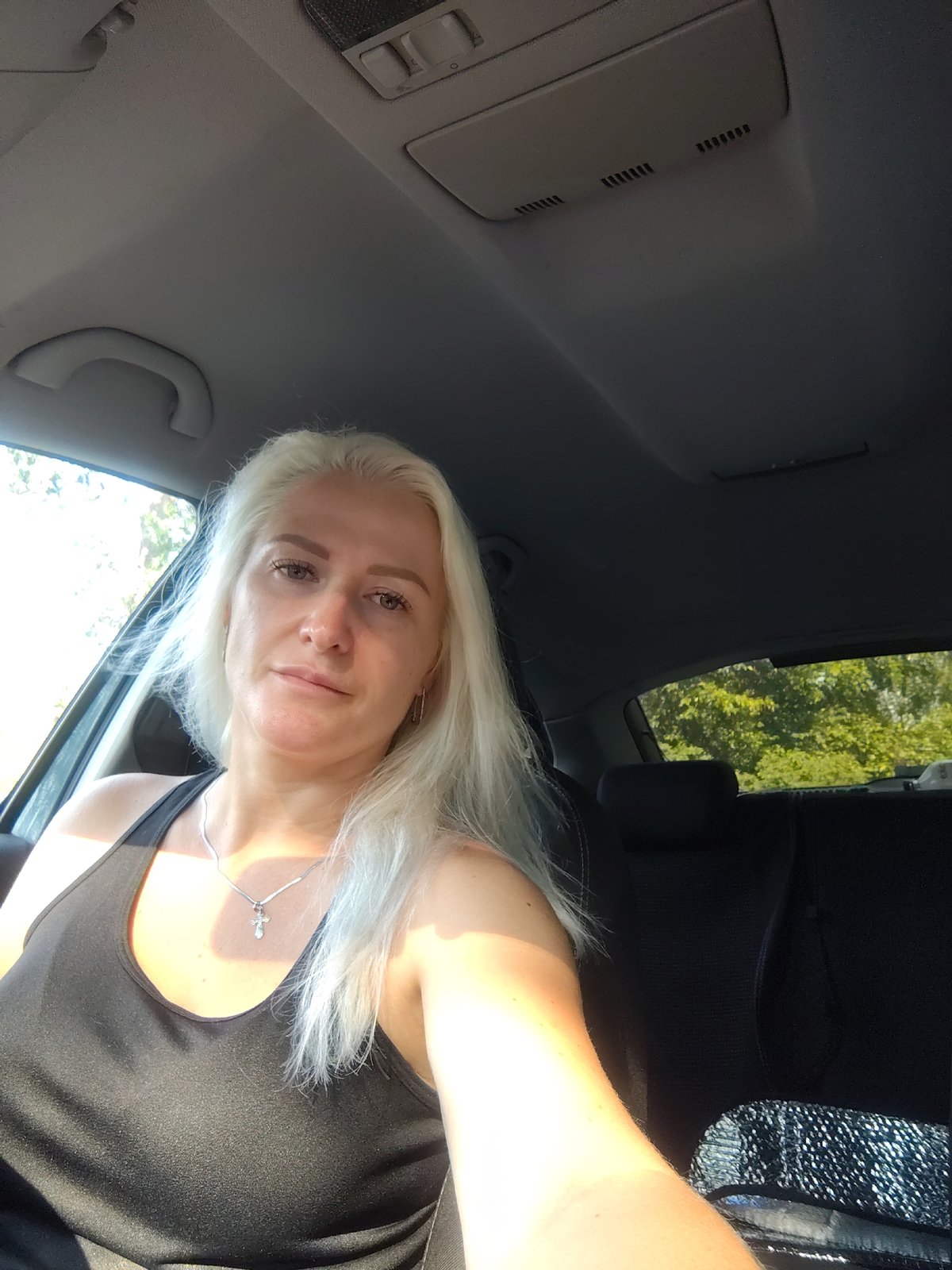 Candid car interior moment in Kyiv, August 2026