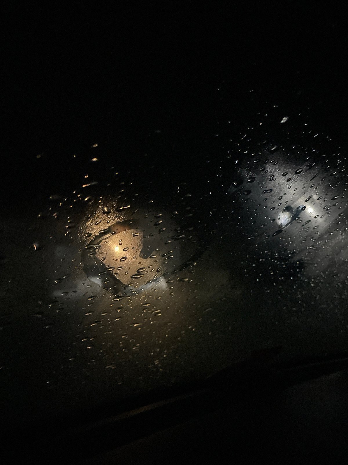 Two women document rainy car journey through Debelt, Bulgaria