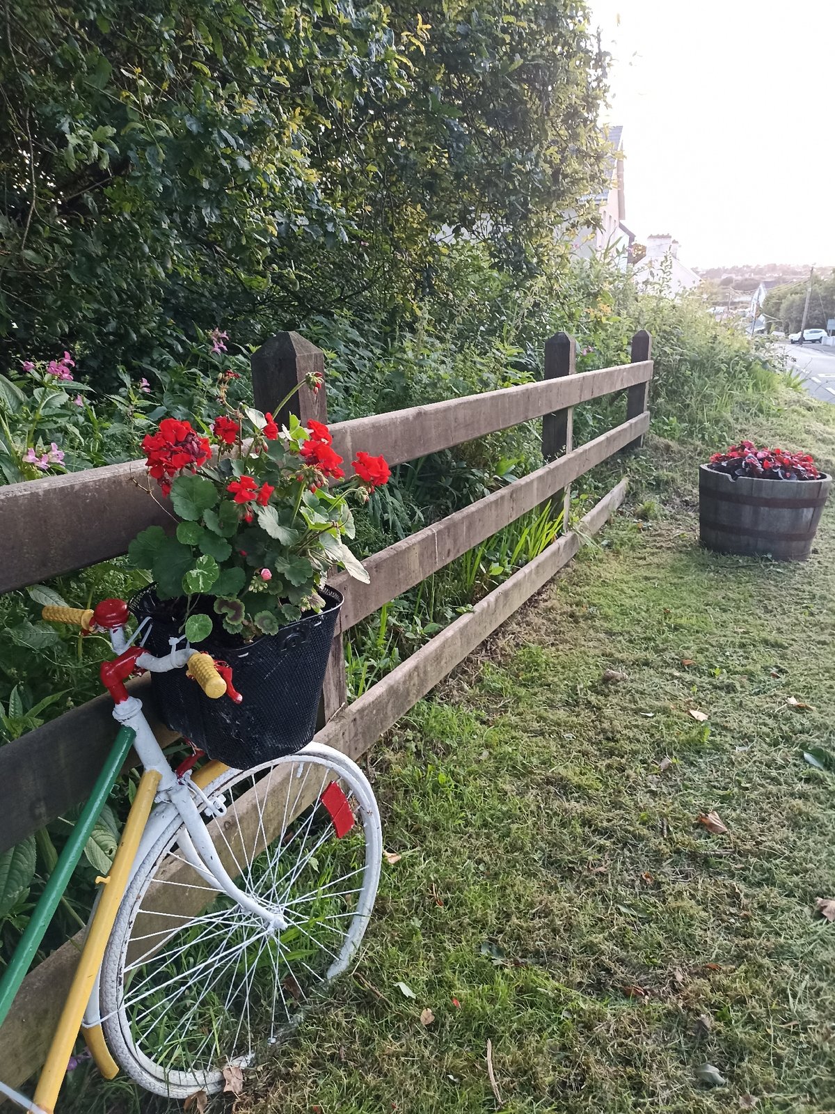 Annagry at dusk: gardens, coastal flats, and a soft summer sunset
