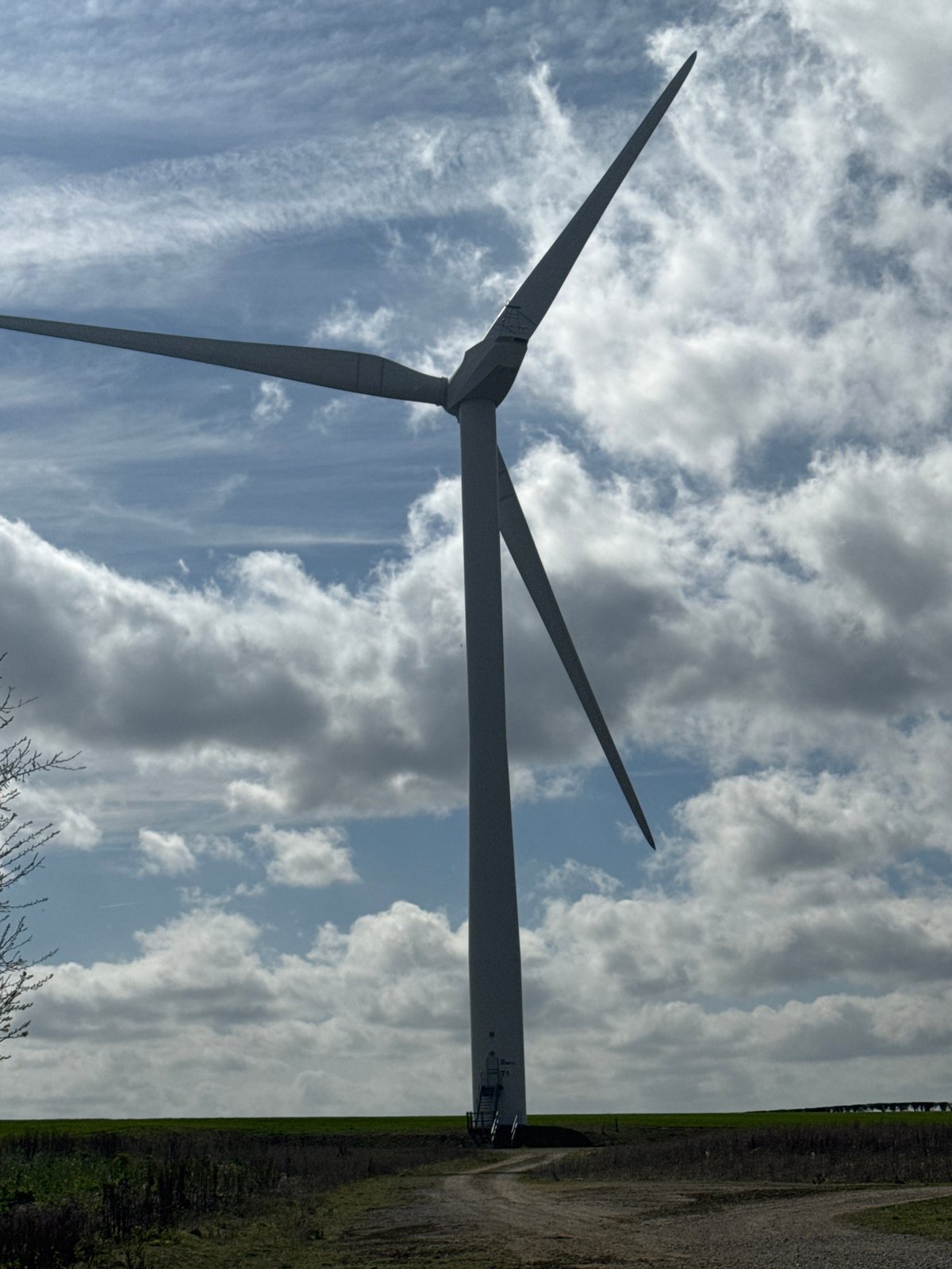 Wind turbine photographed from multiple angles in Rushton countryside