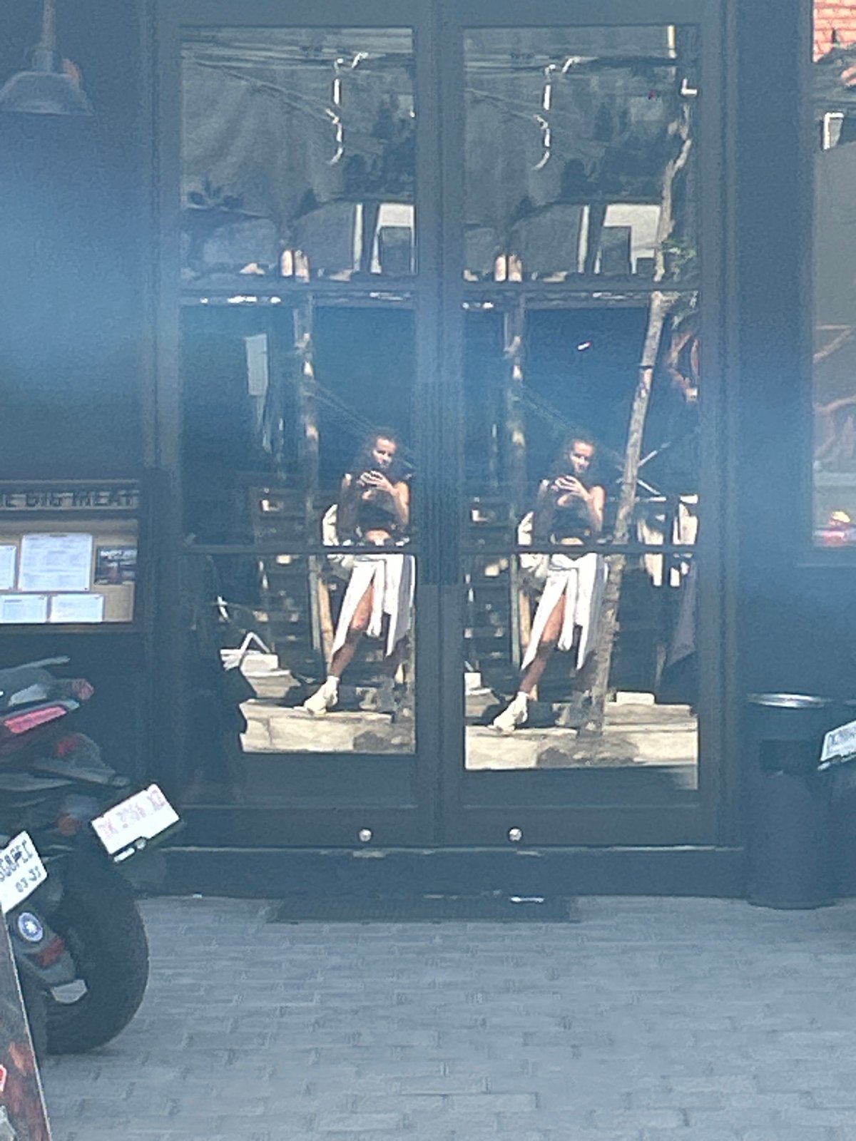 Everyday street life and construction activity in Mengwi, Bali