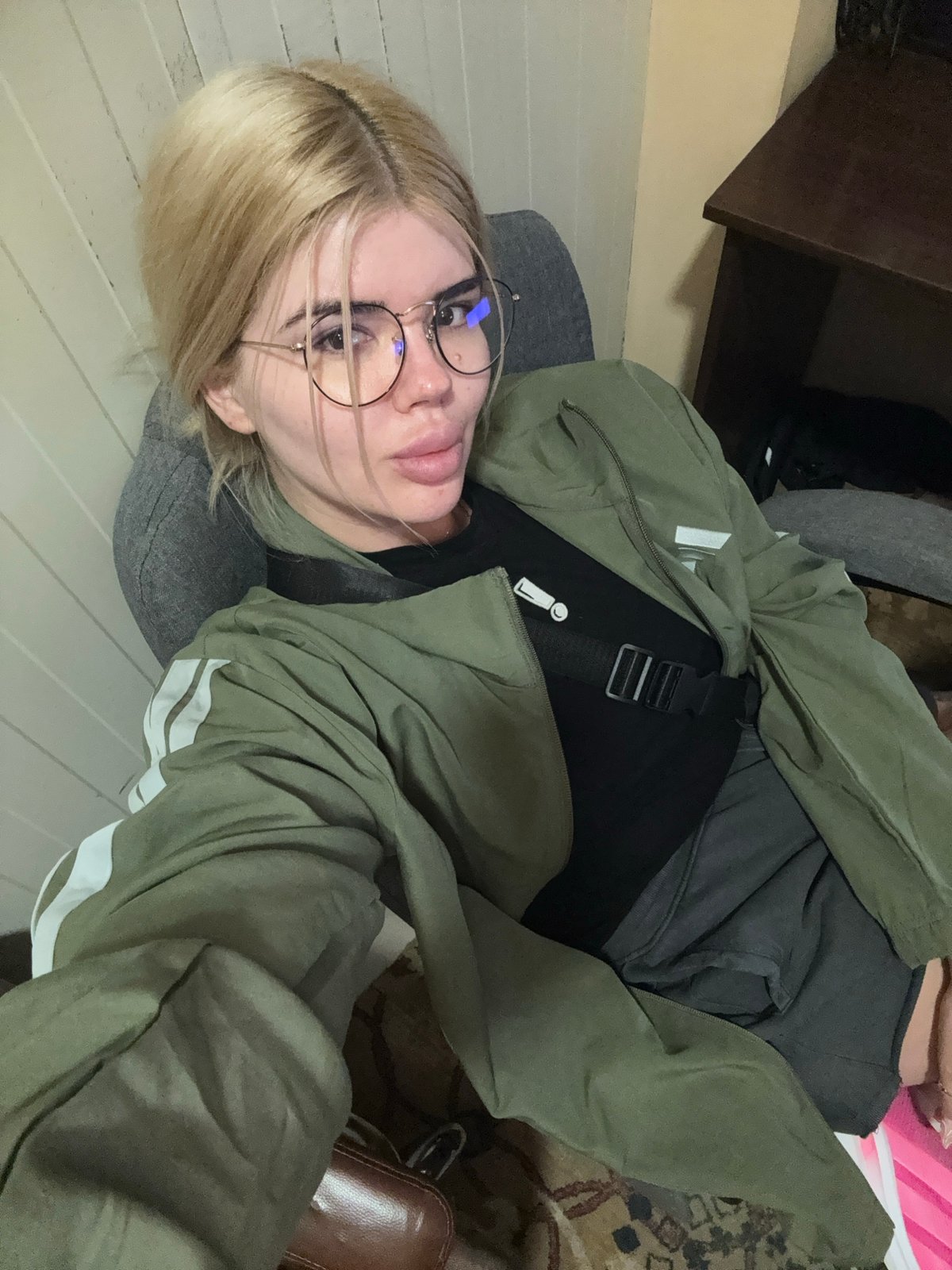 Sitting indoors in Rakovski, casual pose toward camera.