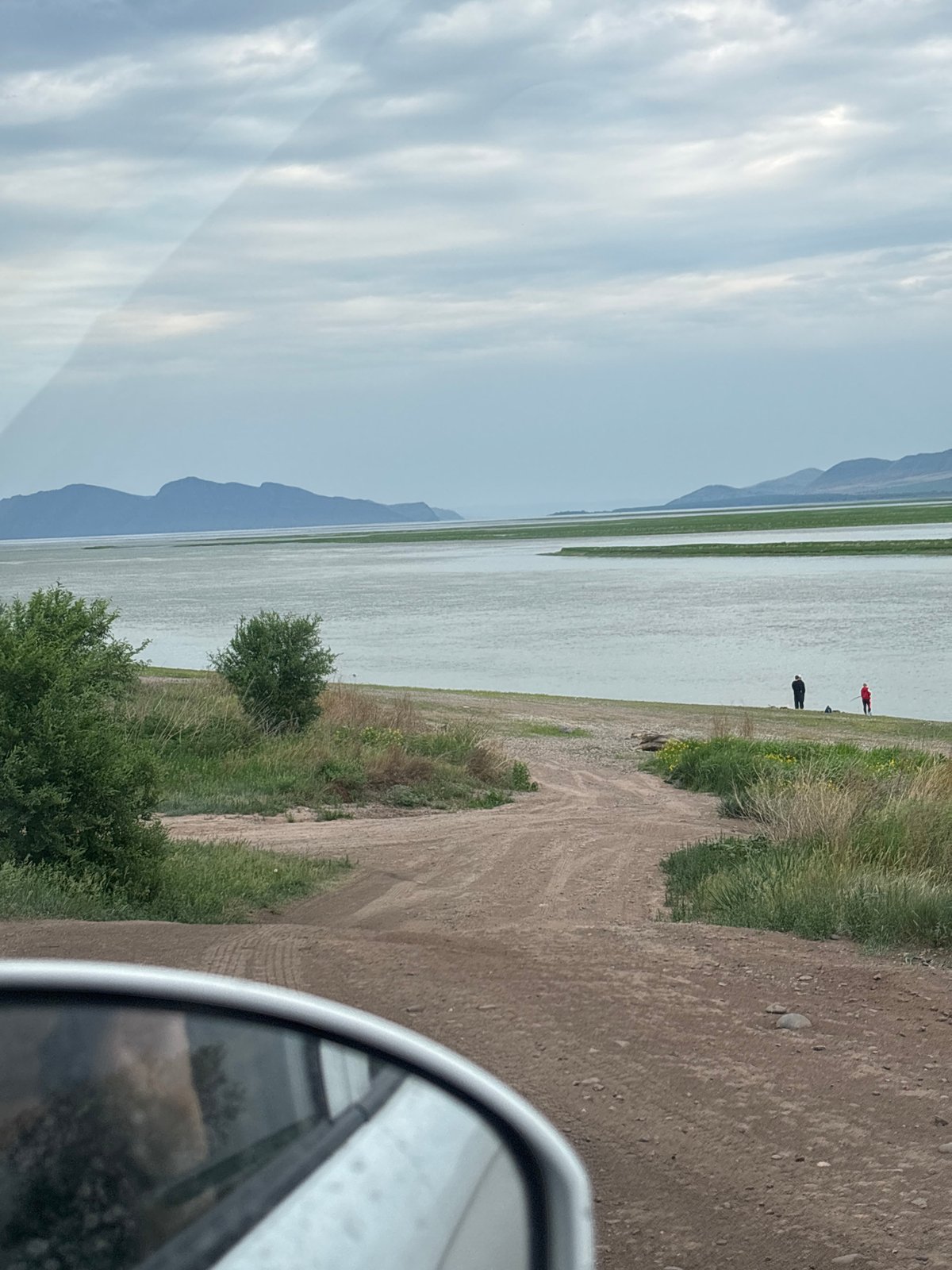 Rural Ust-Abakan landscape documented under cloudy June skies