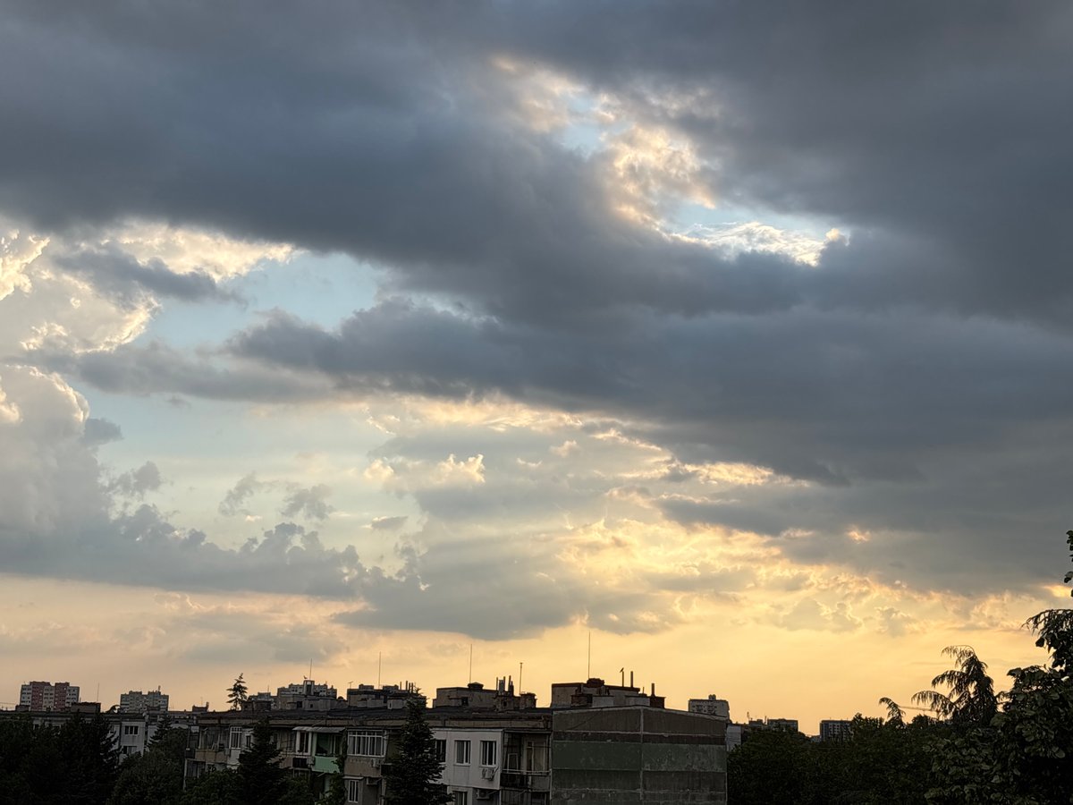 Dramatic storm clouds and golden light observed over Ruse