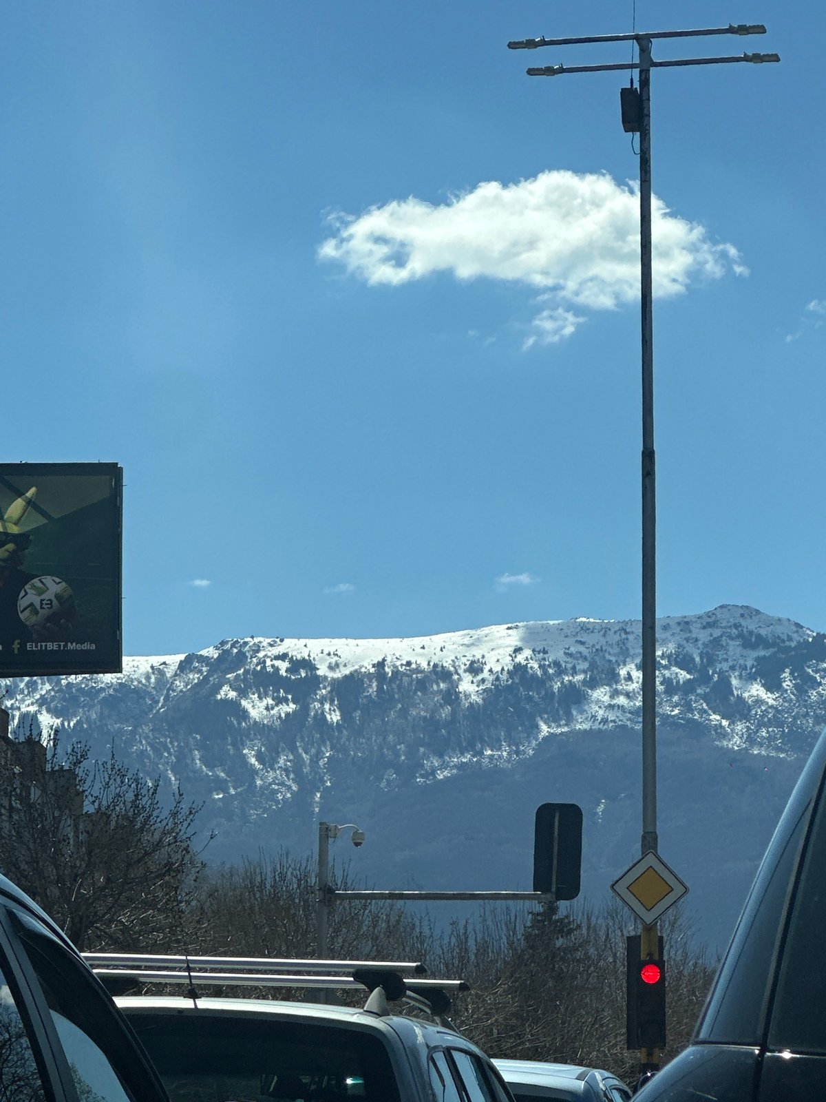 Vehicle passenger captures mountain view in Sofia, Bulgaria