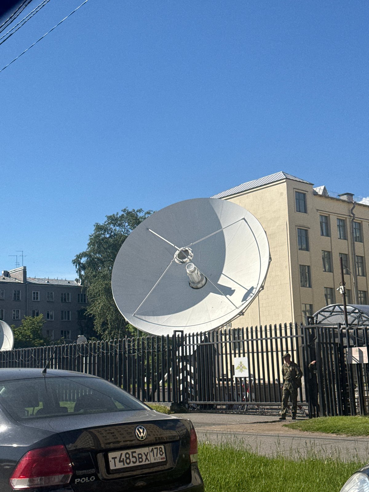 Satellite dish spotted in sunny Saint Petersburg street scene