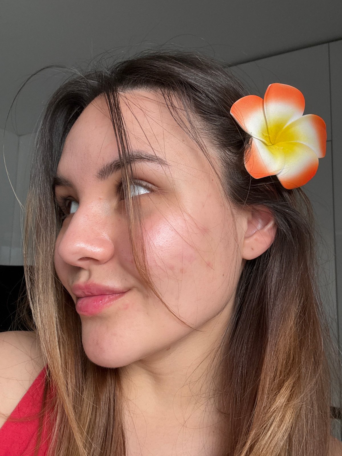 Woman poses with flower hair accessory in Sofia
