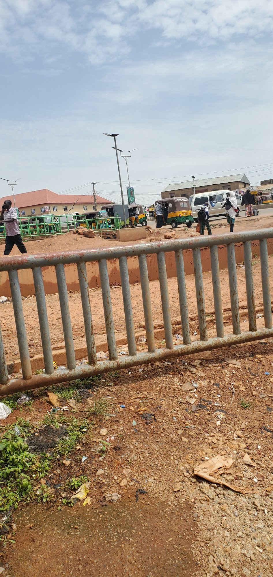 Midday street life and commerce in Gura Top, Nigeria