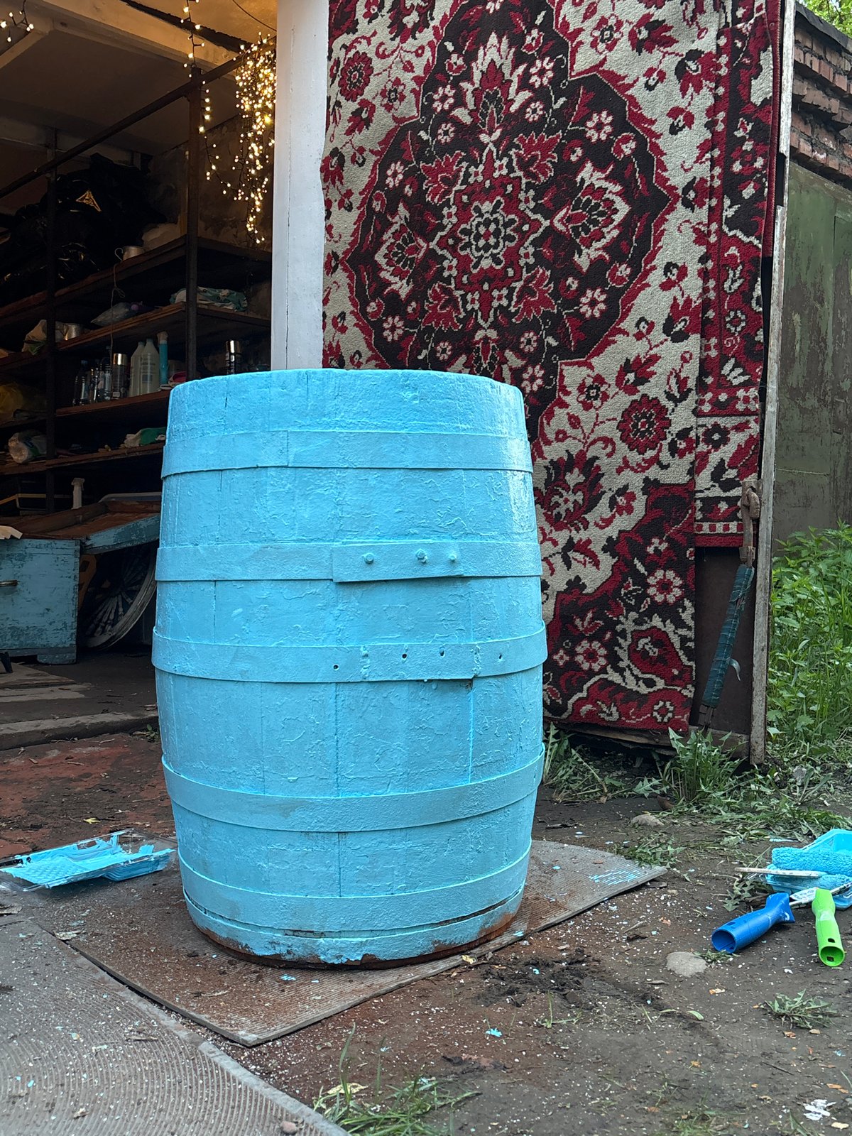 Wooden barrel spotted outdoors in Krasnoyarsk yard setting