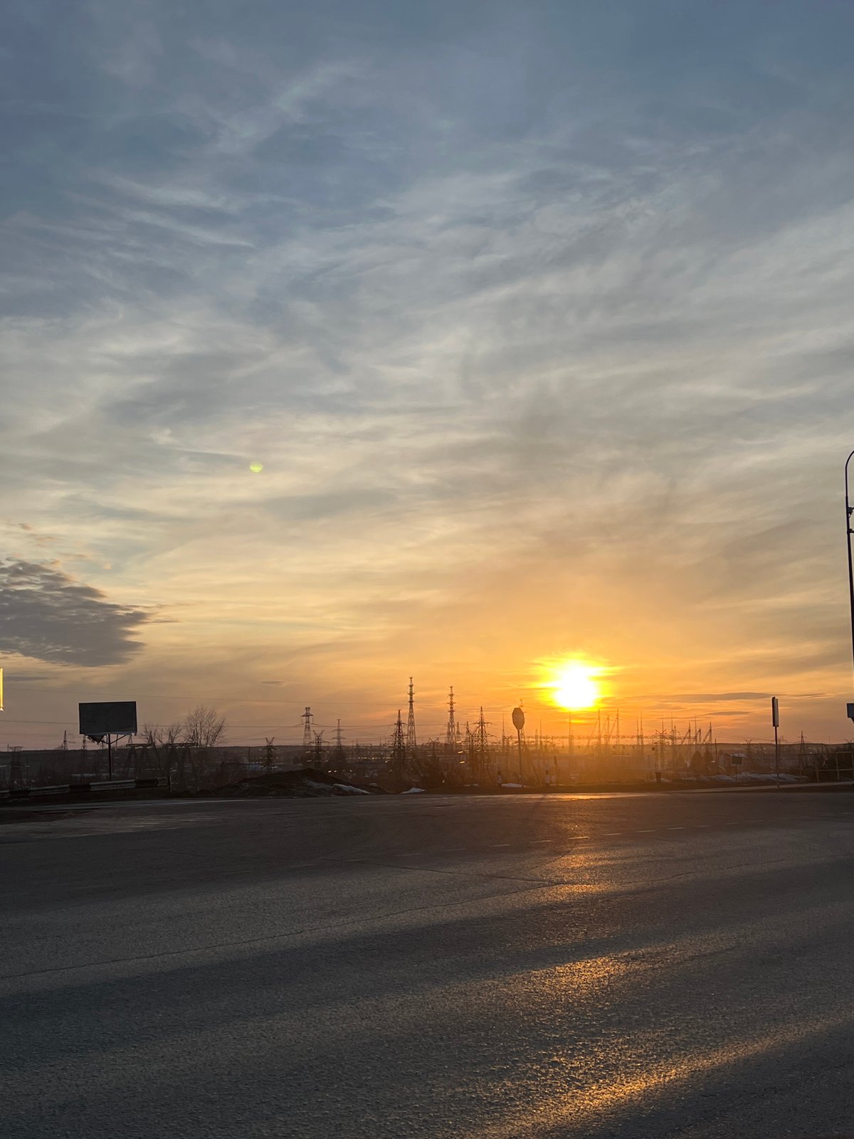 Sunset captured over industrial landscape in Chaikovsky, Russia