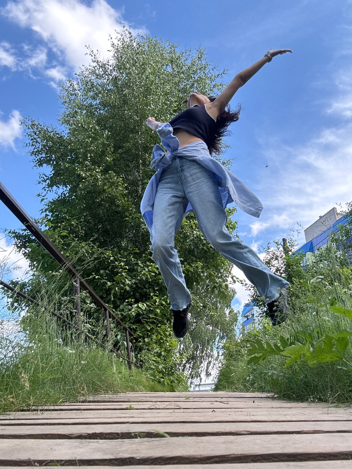 Outdoor photo session on a Chaikovsky boardwalk, sunny morning