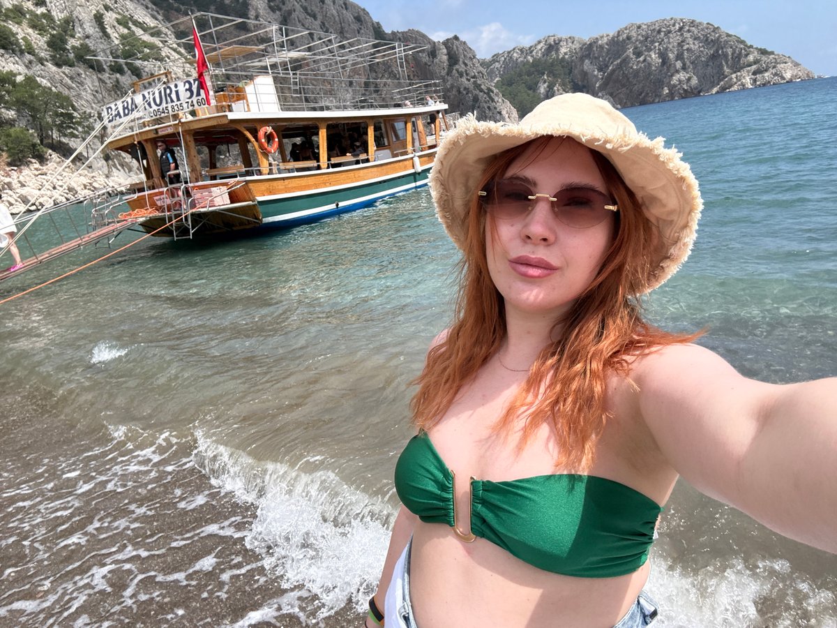 Woman takes beach selfies at scenic Kumluca coastline
