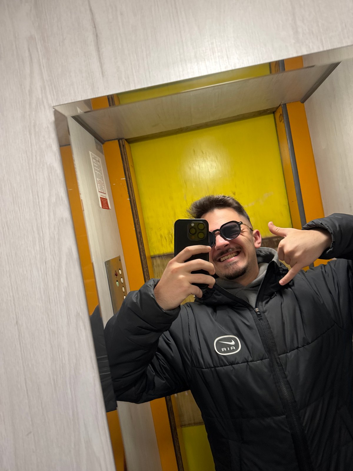 Man Takes Morning Selfie in Sofia Elevator